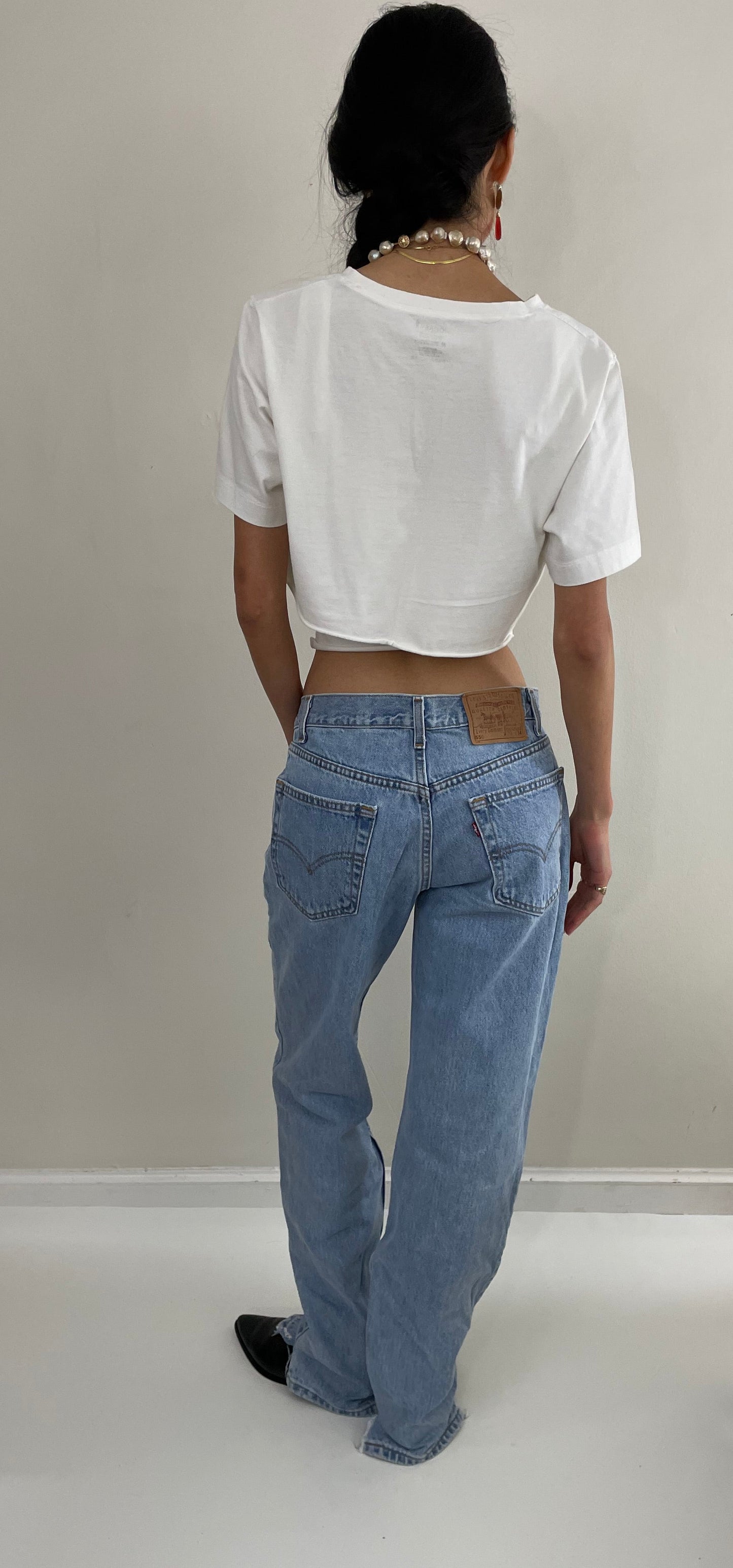 Vintage Levi's faded soft tall boyfriend relaxed fit zipper fly red tab light wash Levis 550 jeans size 31 x 34