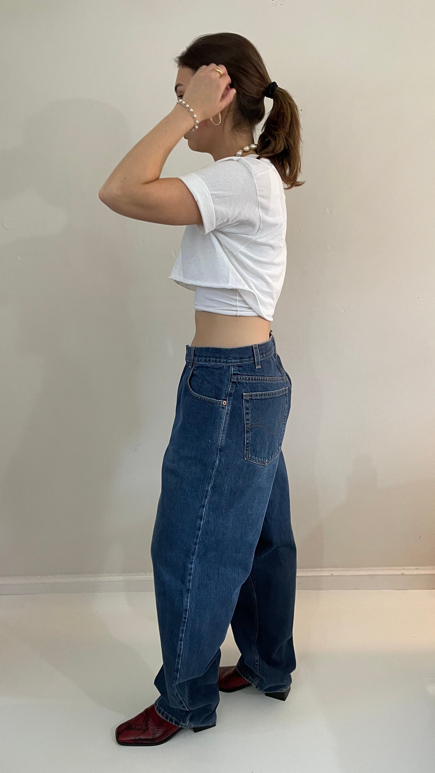 vintage Levi's 570 tall baggy fit zipper fly medium wash 90s barrel leg hip hop jeans size 32 x 35