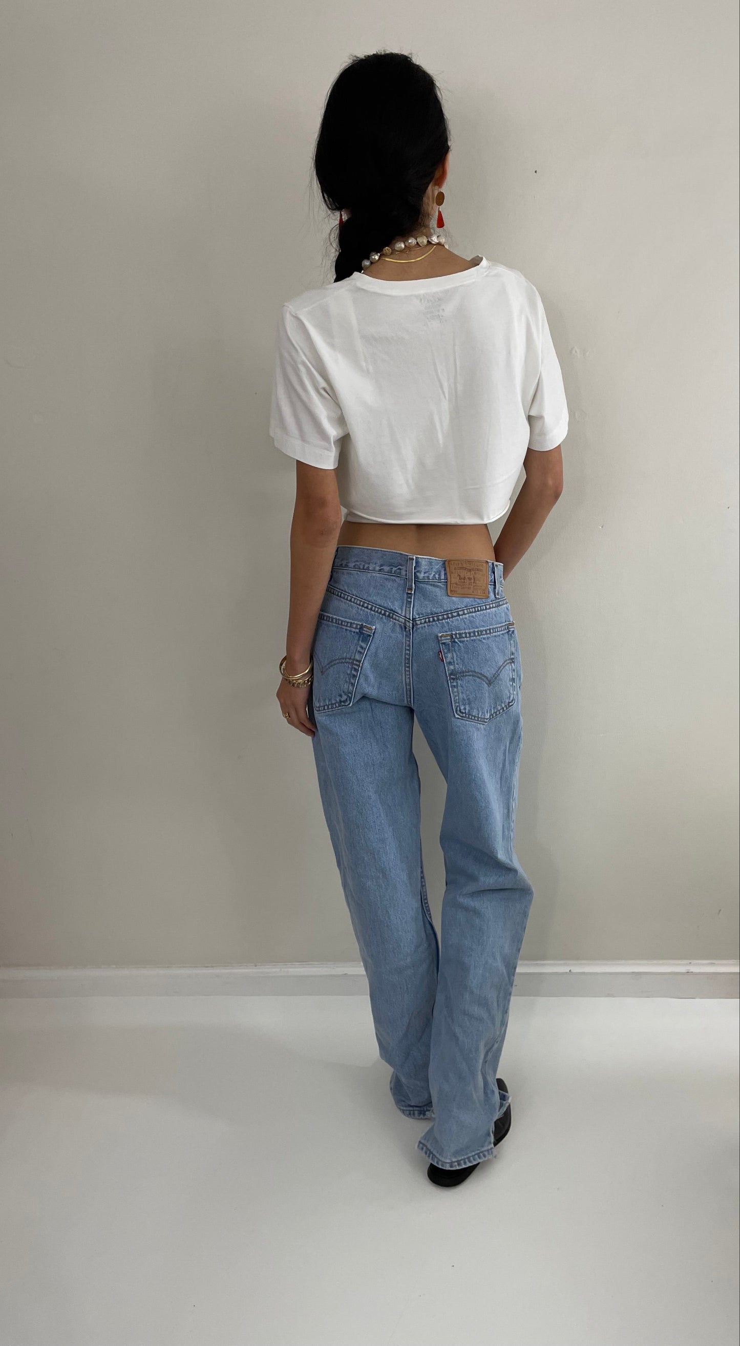 Vintage Levi's faded soft tall boyfriend relaxed fit zipper fly red tab light wash Levis 550 jeans size 31 x 34