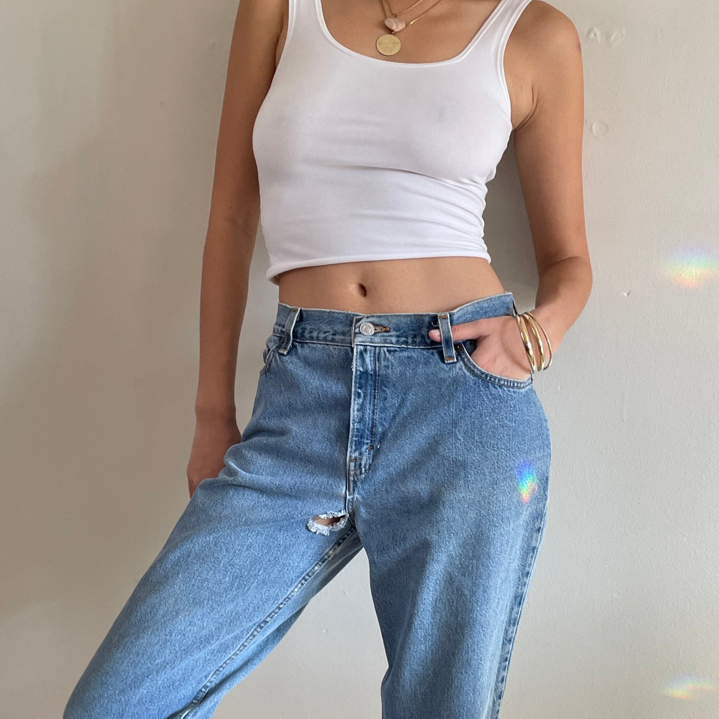 Vintage Levi's 550 high waisted faded light wash zipper Levis jeans made in USA size 29