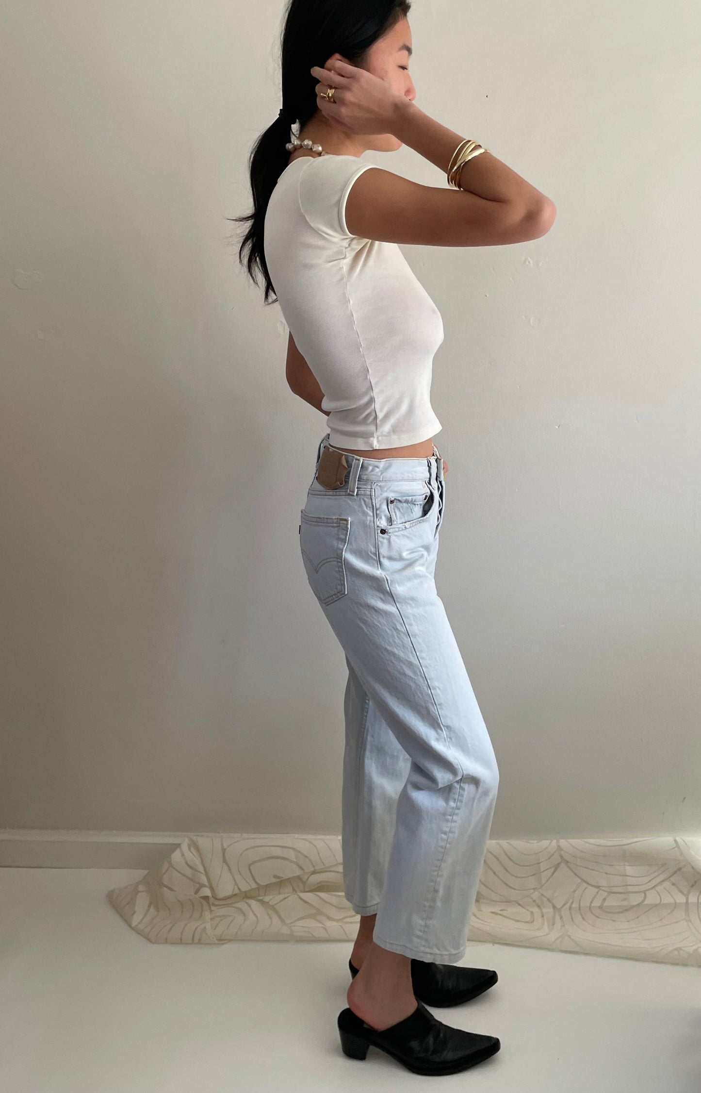 Vintage Levis 501 button fly faded boyfriend light stonewash jeans made in USA size 28