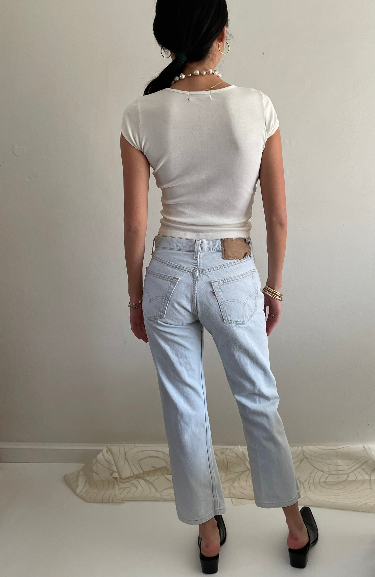 Vintage Levis 501 button fly faded boyfriend light stonewash jeans made in USA size 28