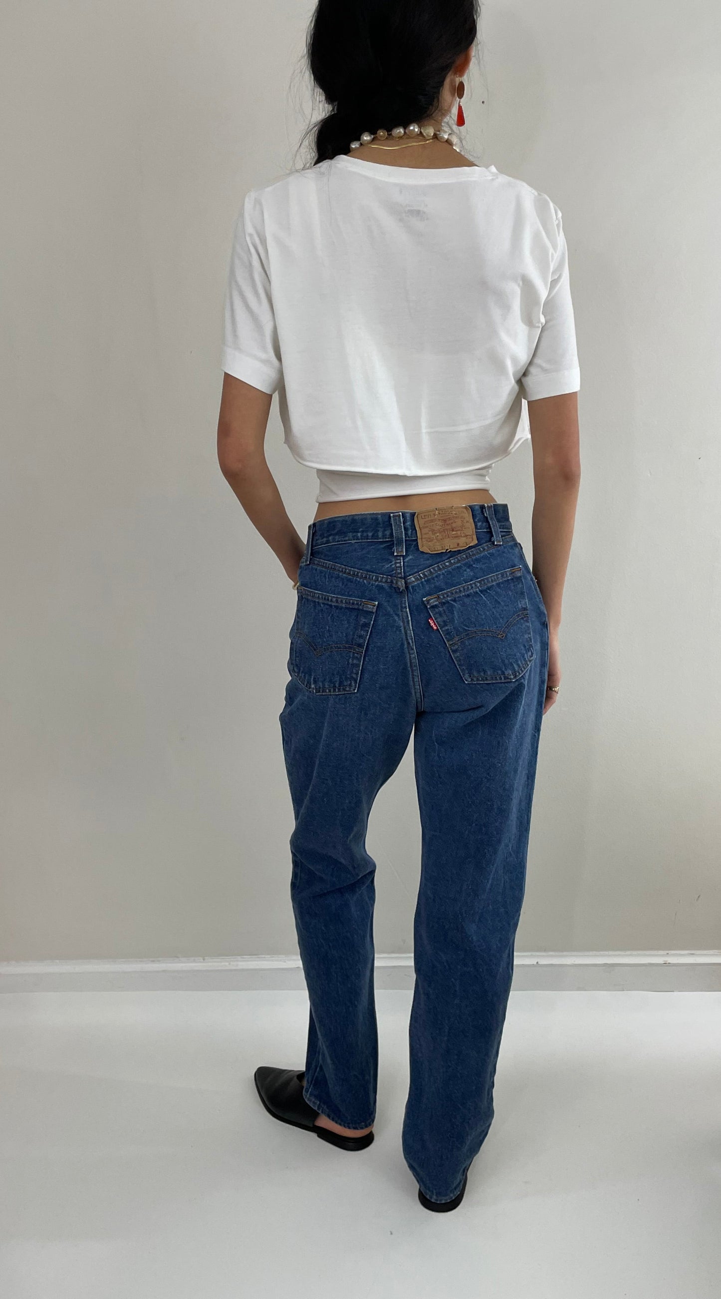 Vintage 80s Levi's 501 dark wash shrink to fit high waisted made for Women button fly tall Levis jeans size 27 x 32