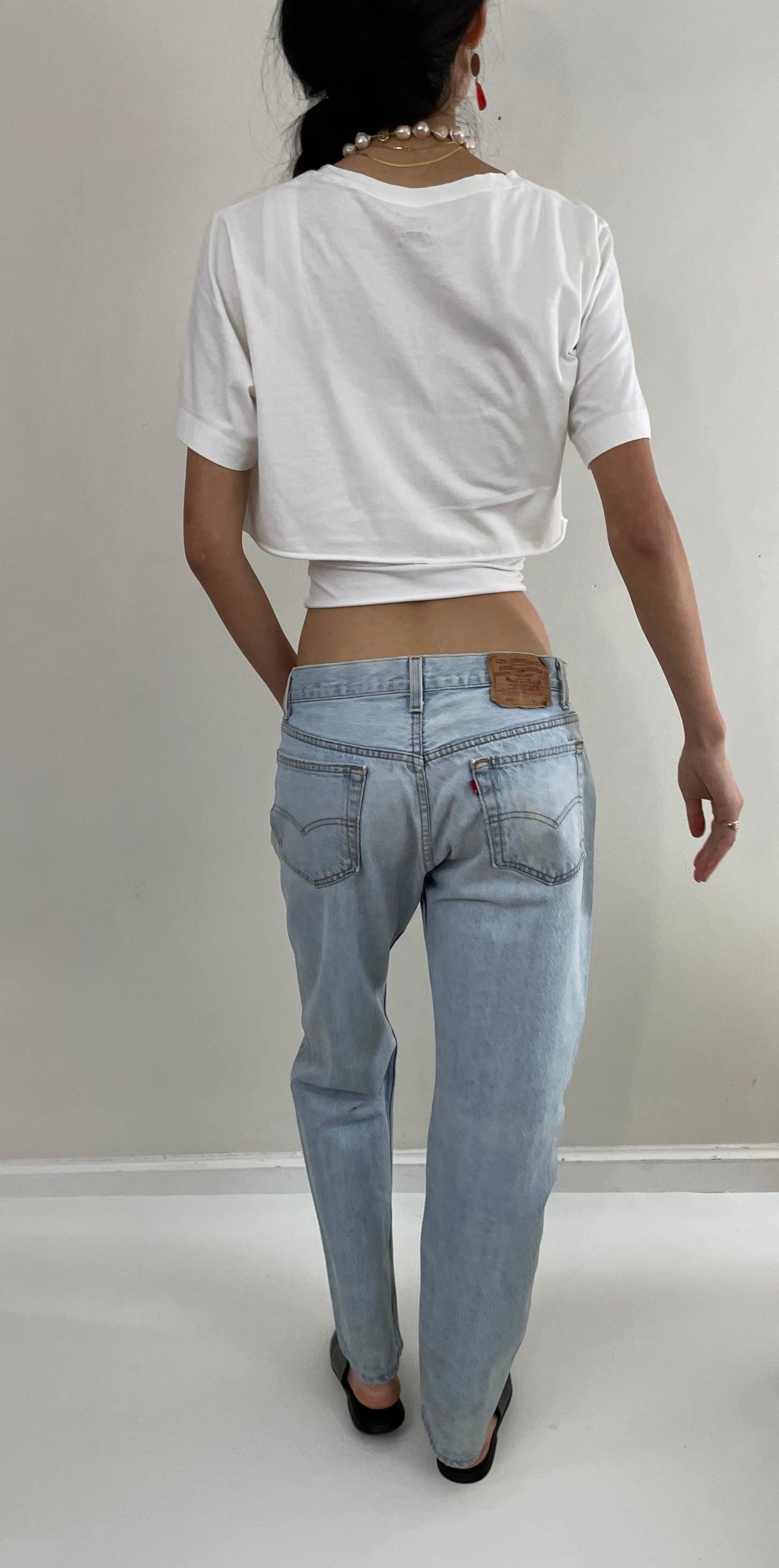 Vintage 80s Levi's 501 faded button fly light stone wash red tab Levis iconic jeans USA size 32 x 29