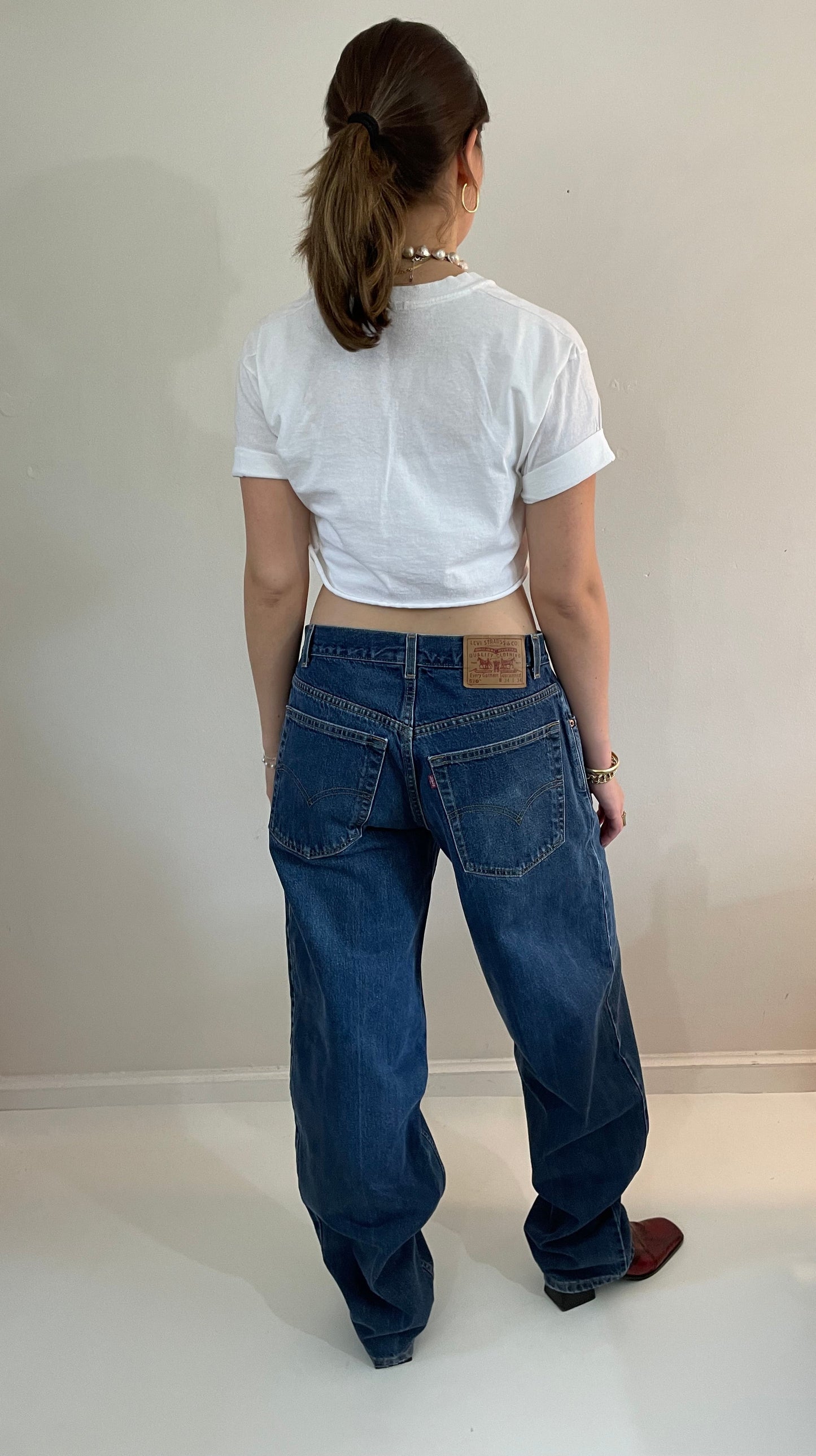 vintage Levi's 570 tall baggy fit zipper fly medium wash 90s barrel leg hip hop jeans size 32 x 35