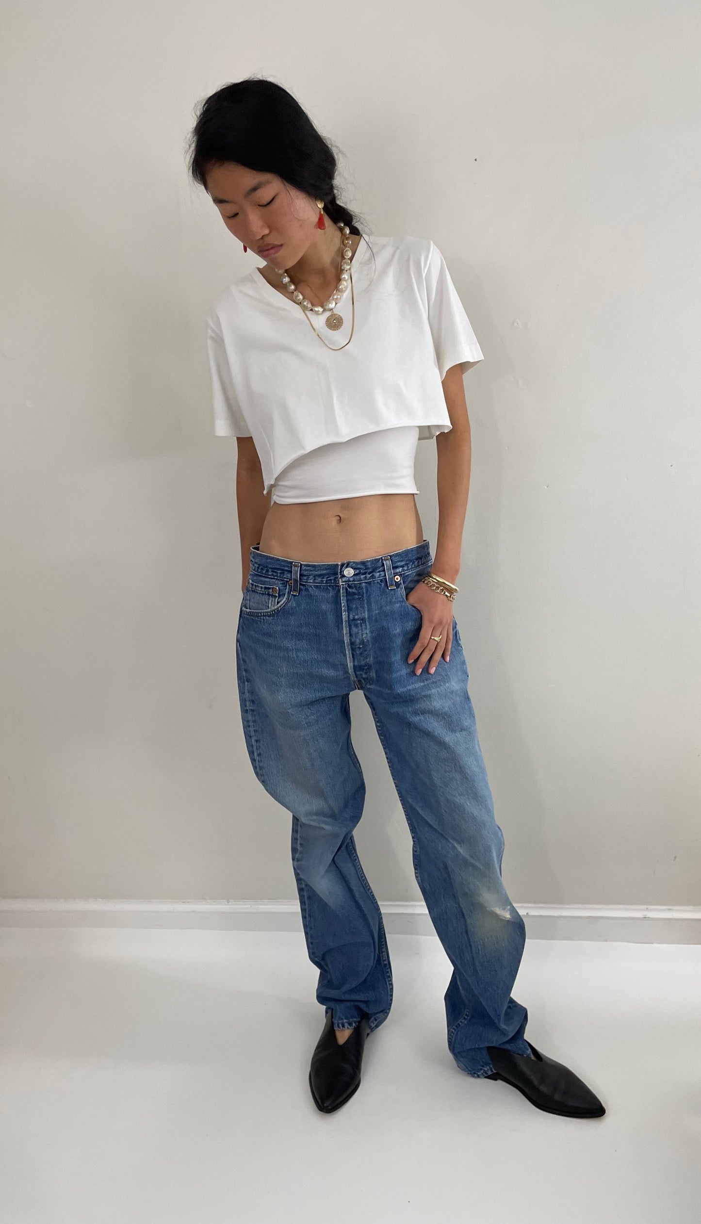 Vintage 80s Levis 501 button fly soft faded tall boyfriend baggy medium wash Levis jeans made in USA size 33 x 34
