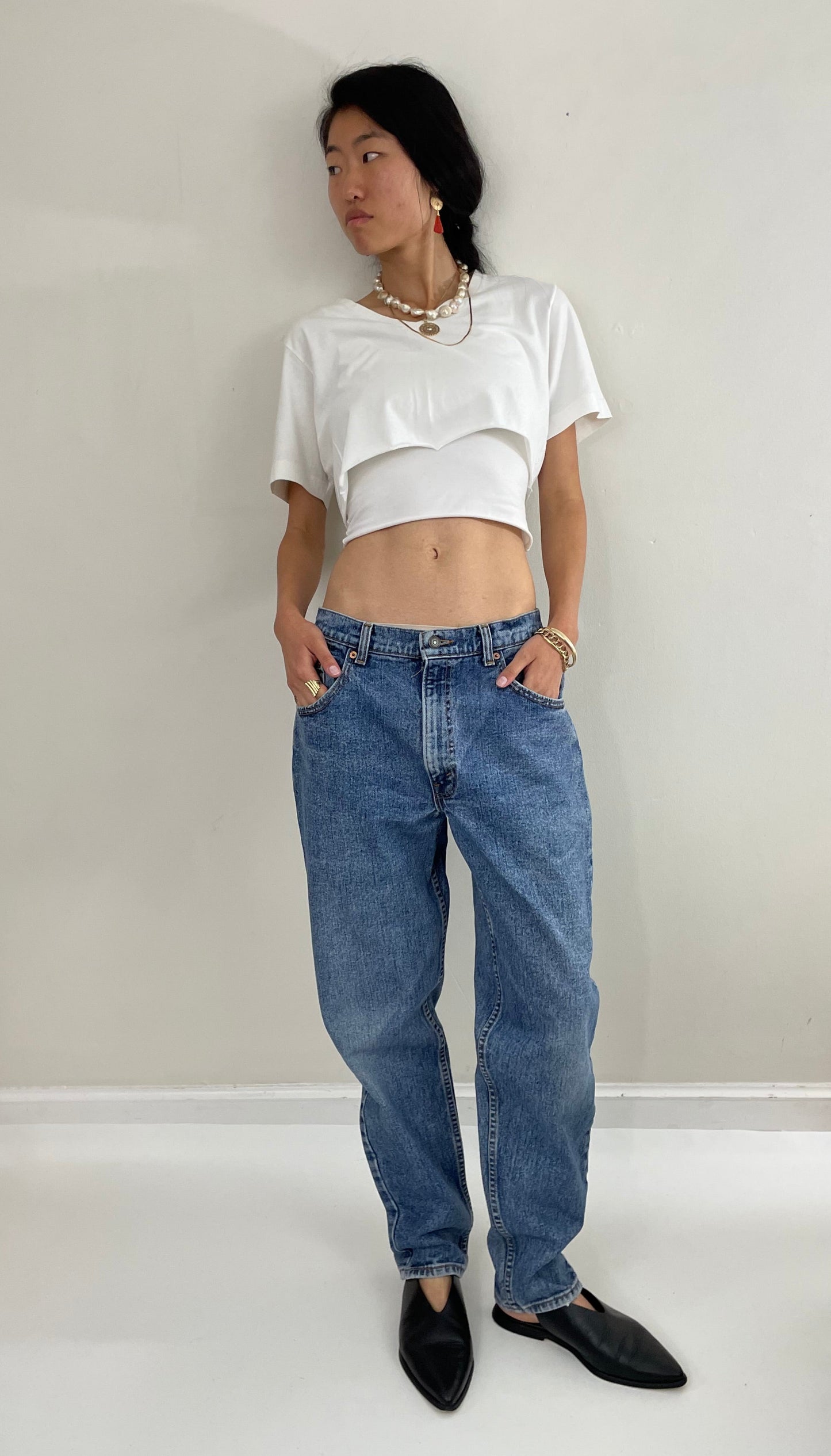 Vintage 80s Levi's 560 medium wash high waisted zipper relaxed faded red tab Levis jeans USA size 31 x 30