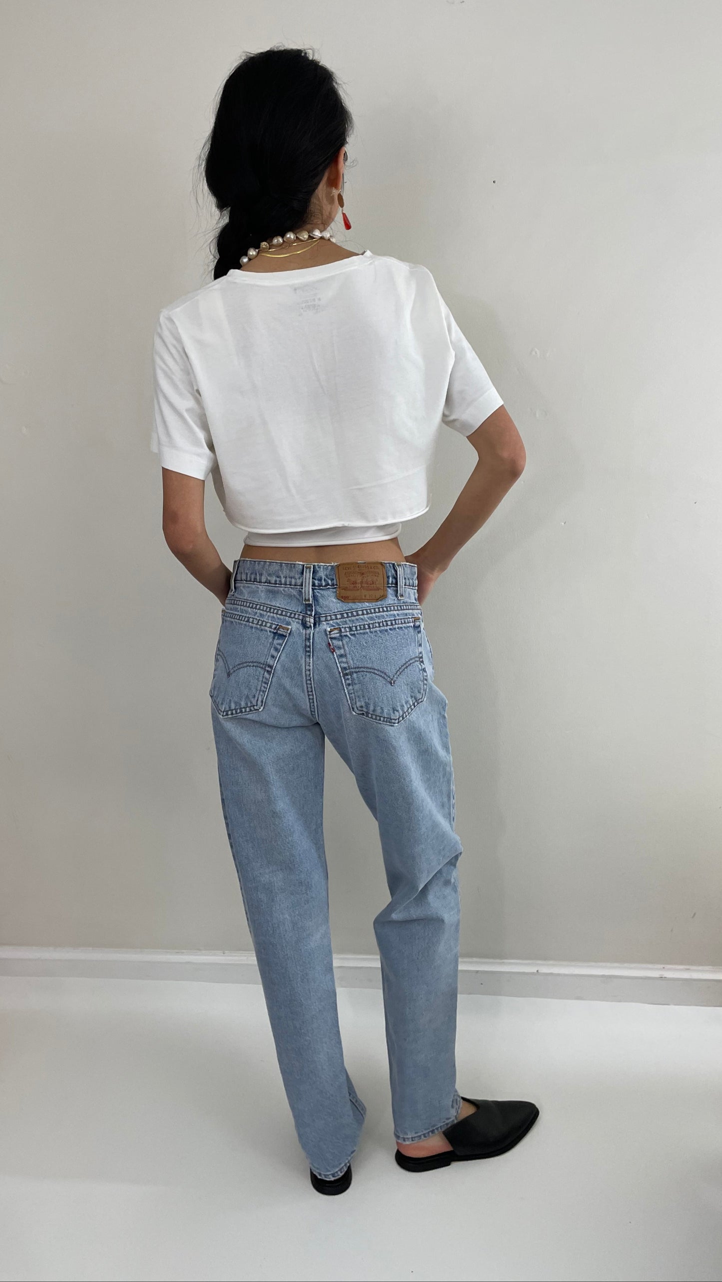 Vintage Levi's faded soft boyfriend relaxed fit high waisted zipper fly red tab light wash Levis 550 Dad jeans made in USA size Waist 31 x 33