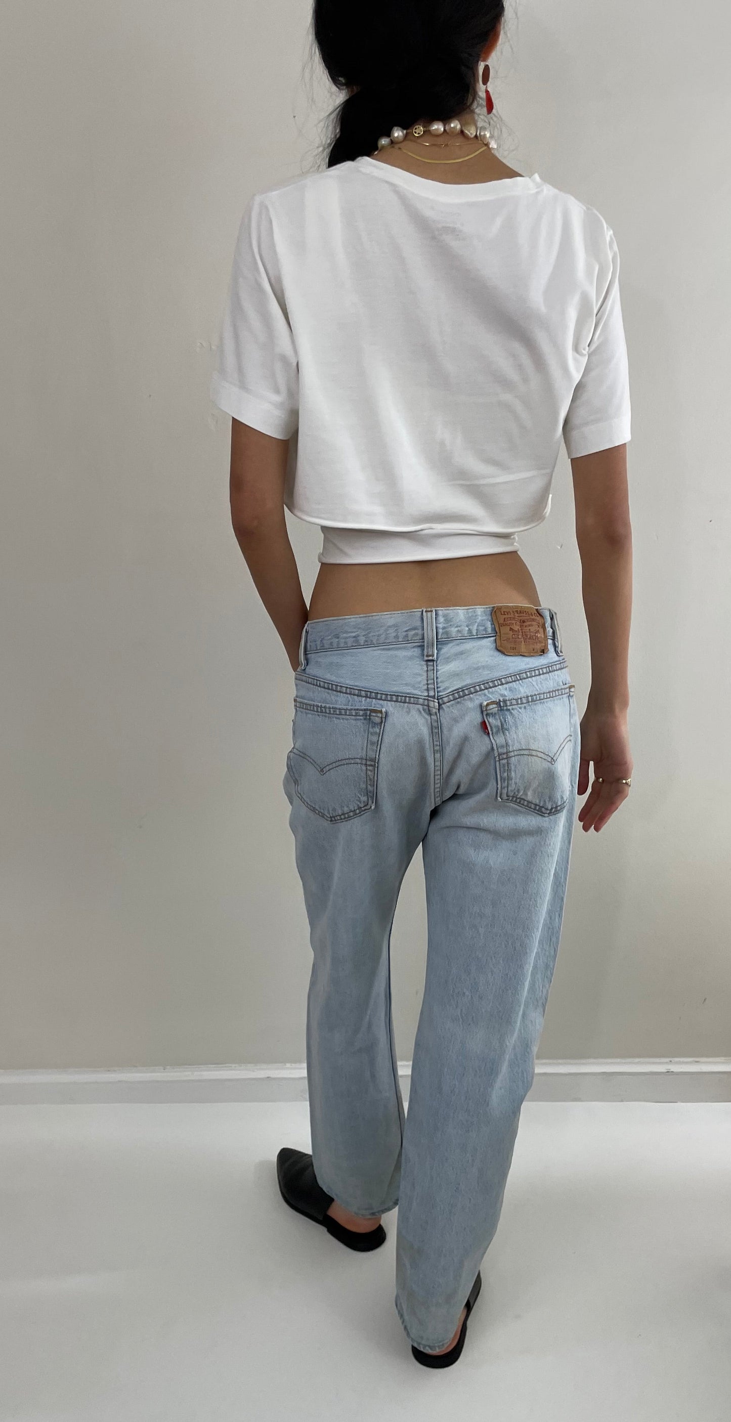 Vintage 80s Levi's 501 faded button fly light stone wash red tab Levis iconic jeans USA size 32 x 29