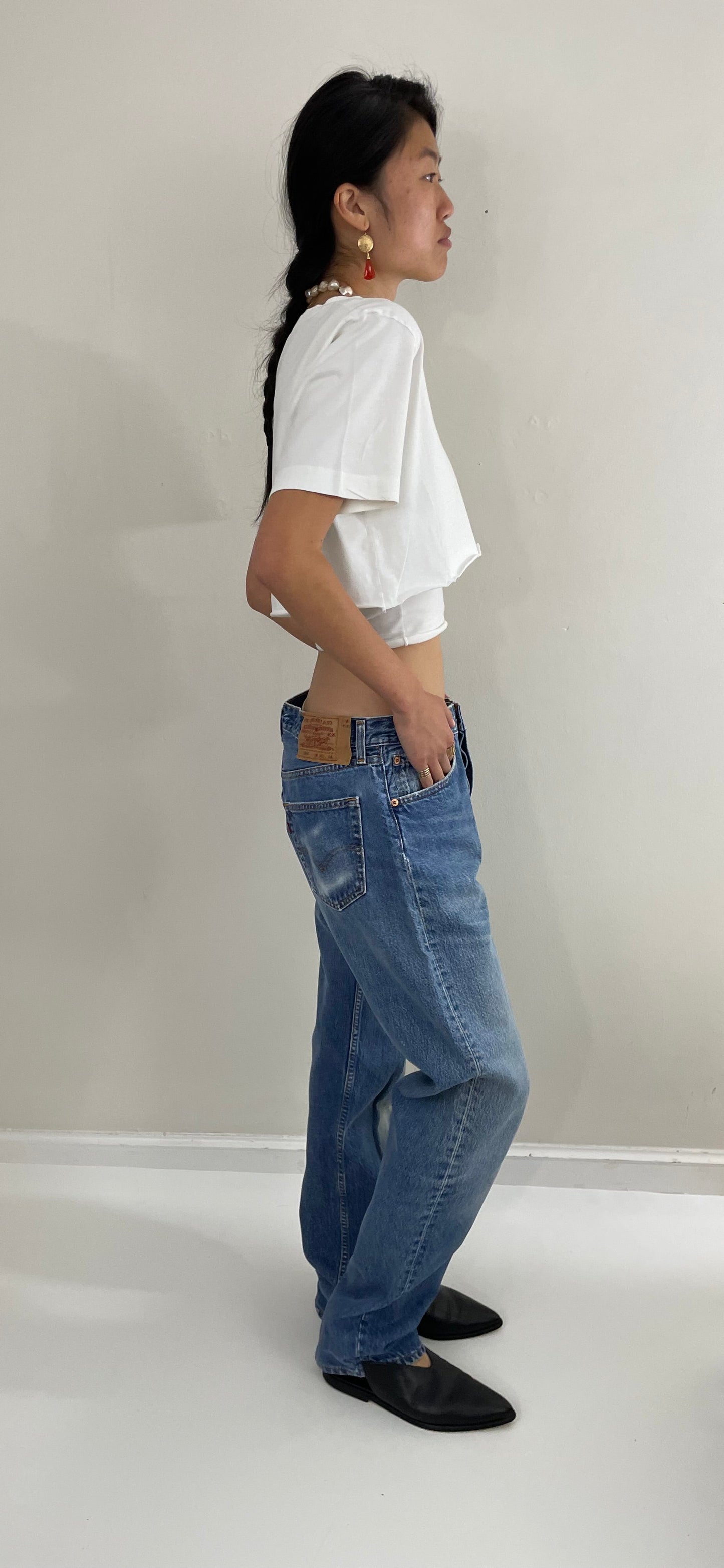 Vintage 80s Levis 501 button fly soft faded tall boyfriend baggy medium wash Levis jeans made in USA size 33 x 34