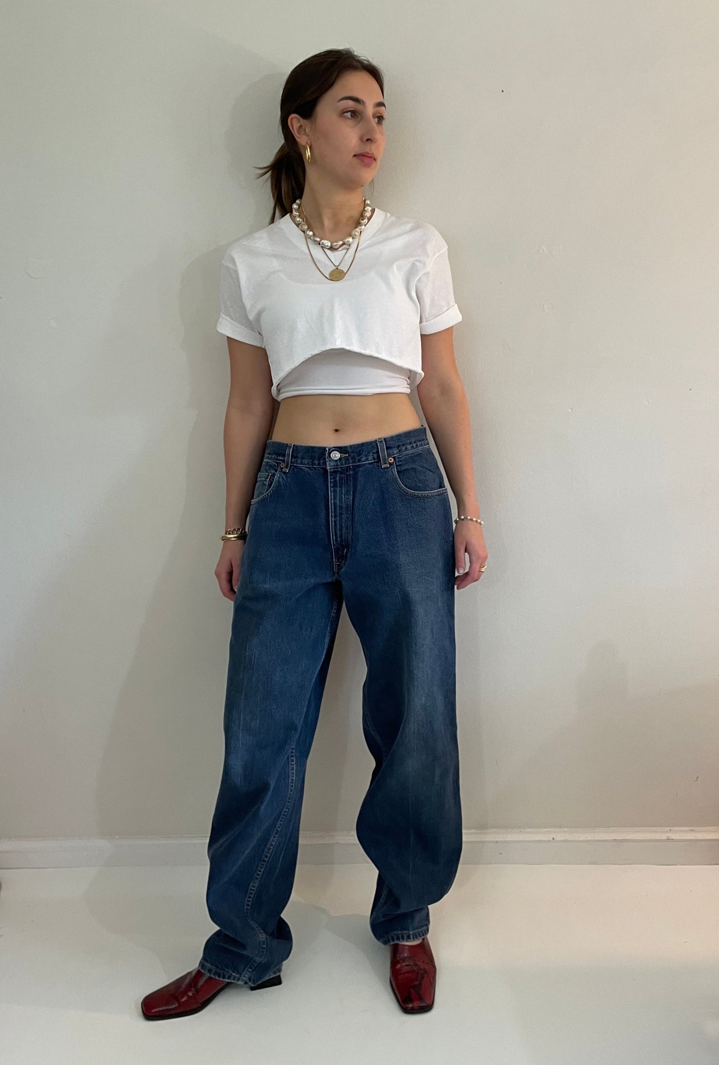 vintage Levi's 570 tall baggy fit zipper fly medium wash 90s barrel leg hip hop jeans size 32 x 35