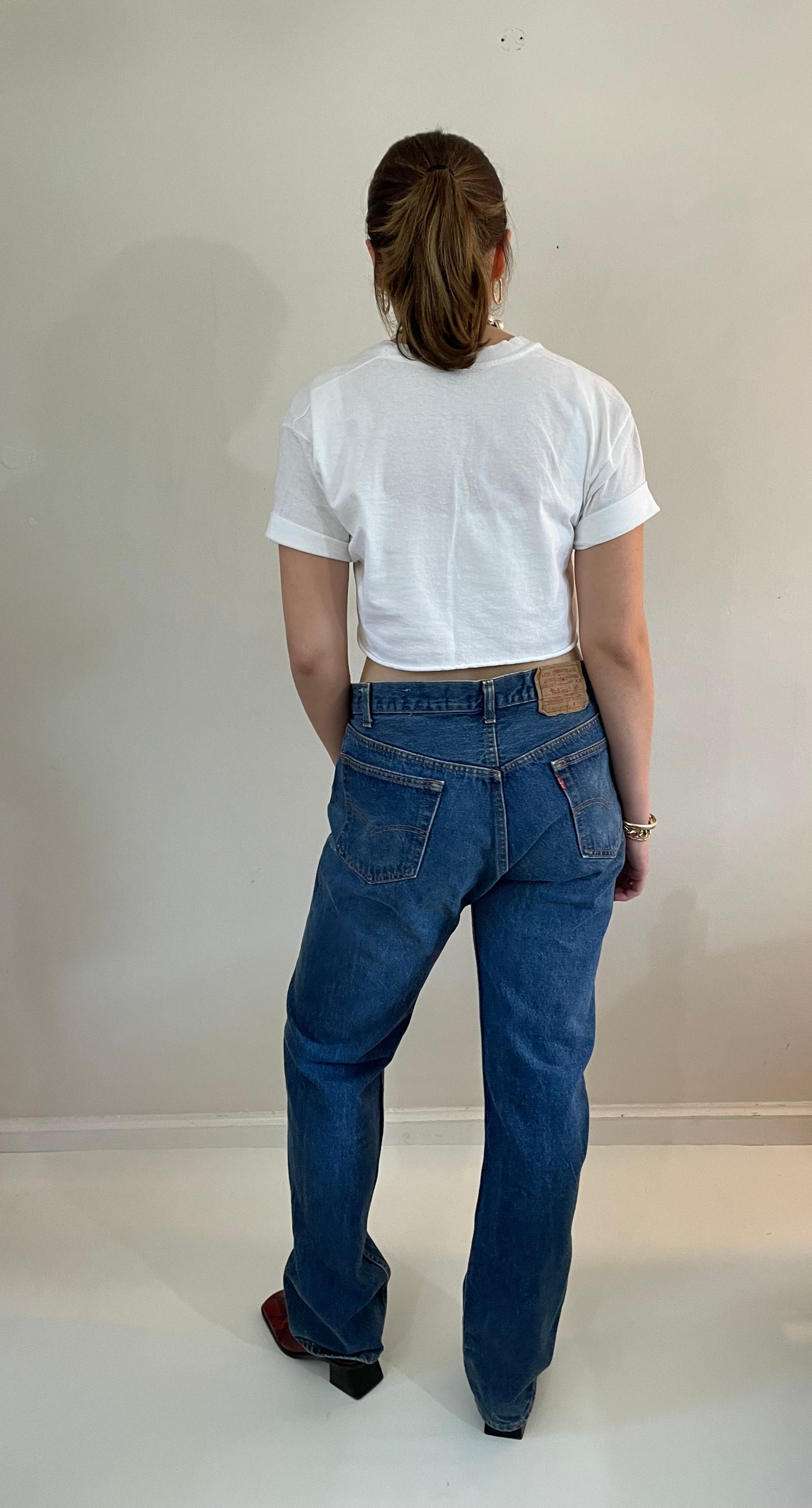 vintage Levi's 501 medium dark wash button fly tall boyfriend jeans made in USA size 33