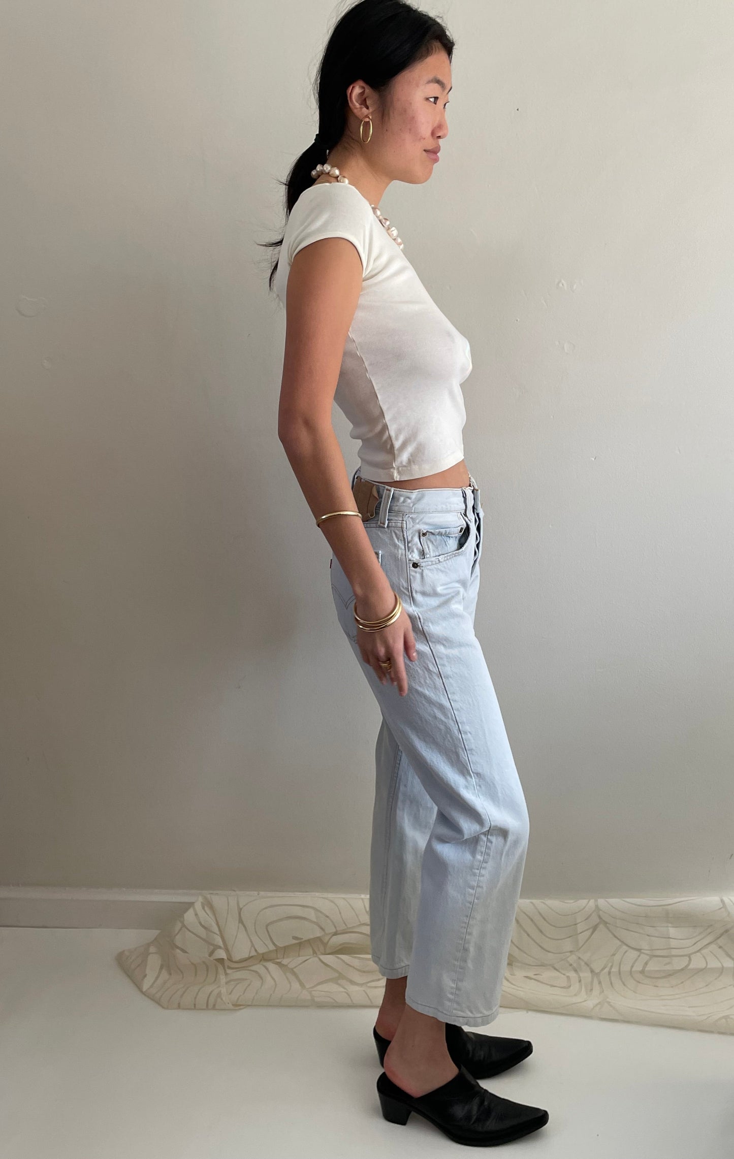 Vintage Levis 501 button fly faded boyfriend light stonewash jeans made in USA size 28