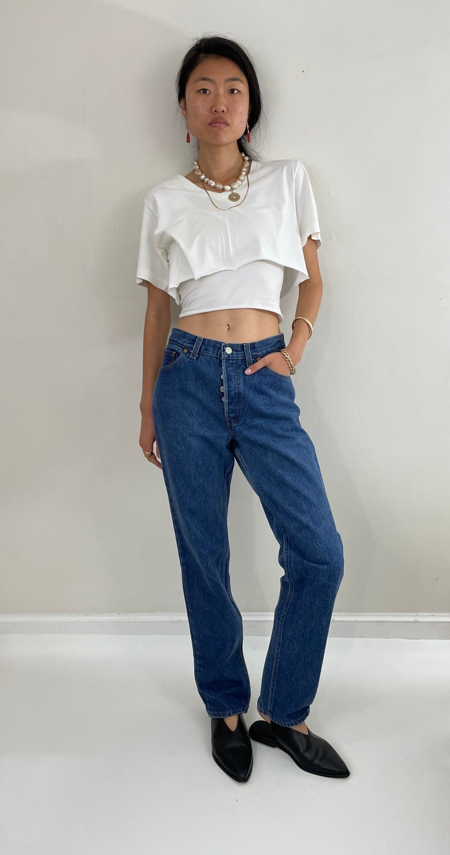 Vintage 80s Levi's 501 dark wash shrink to fit high waisted made for Women button fly tall Levis jeans size 27 x 32