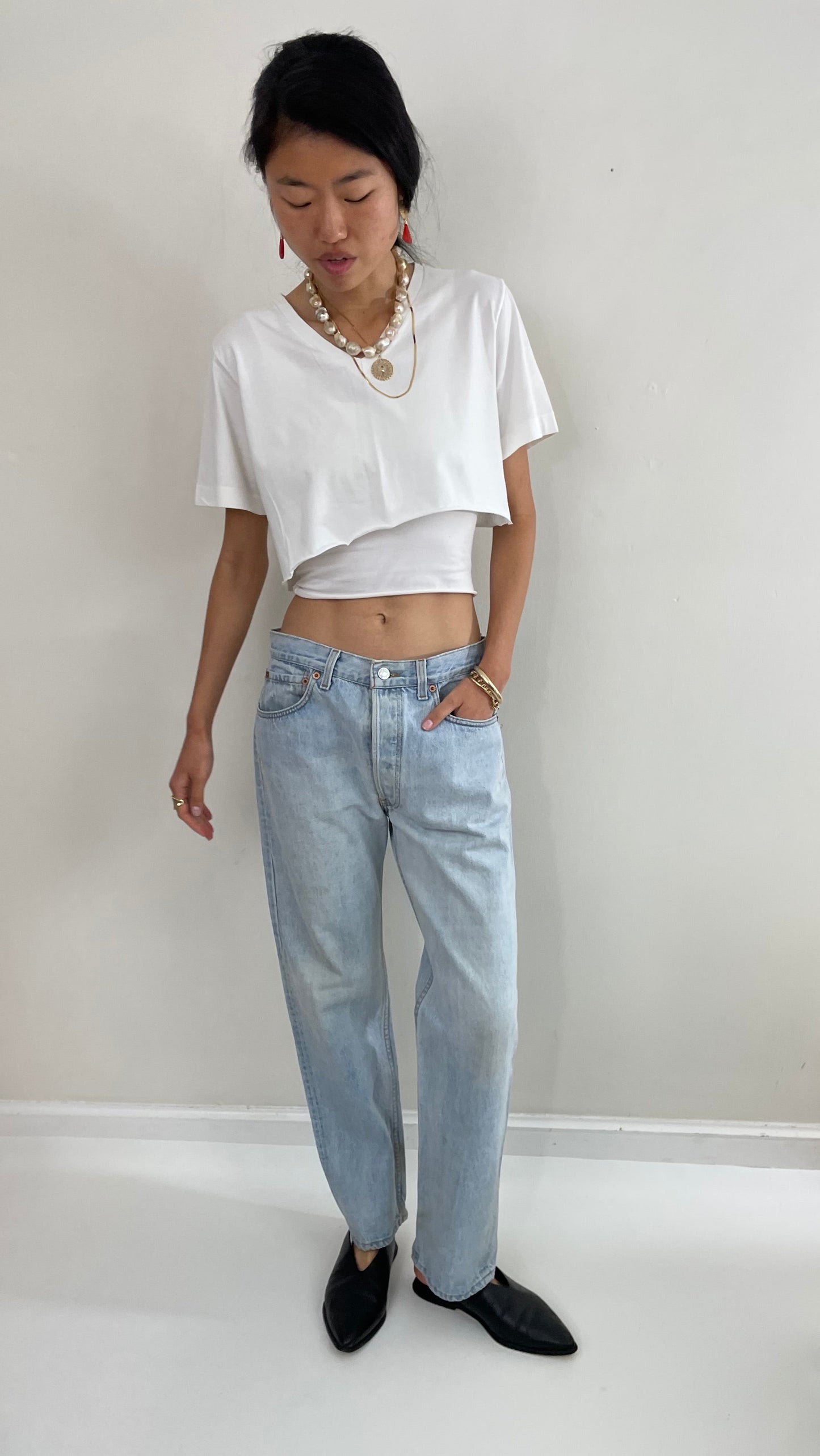 Vintage 80s Levi's 501 faded button fly light stone wash red tab Levis iconic jeans USA size 32 x 29