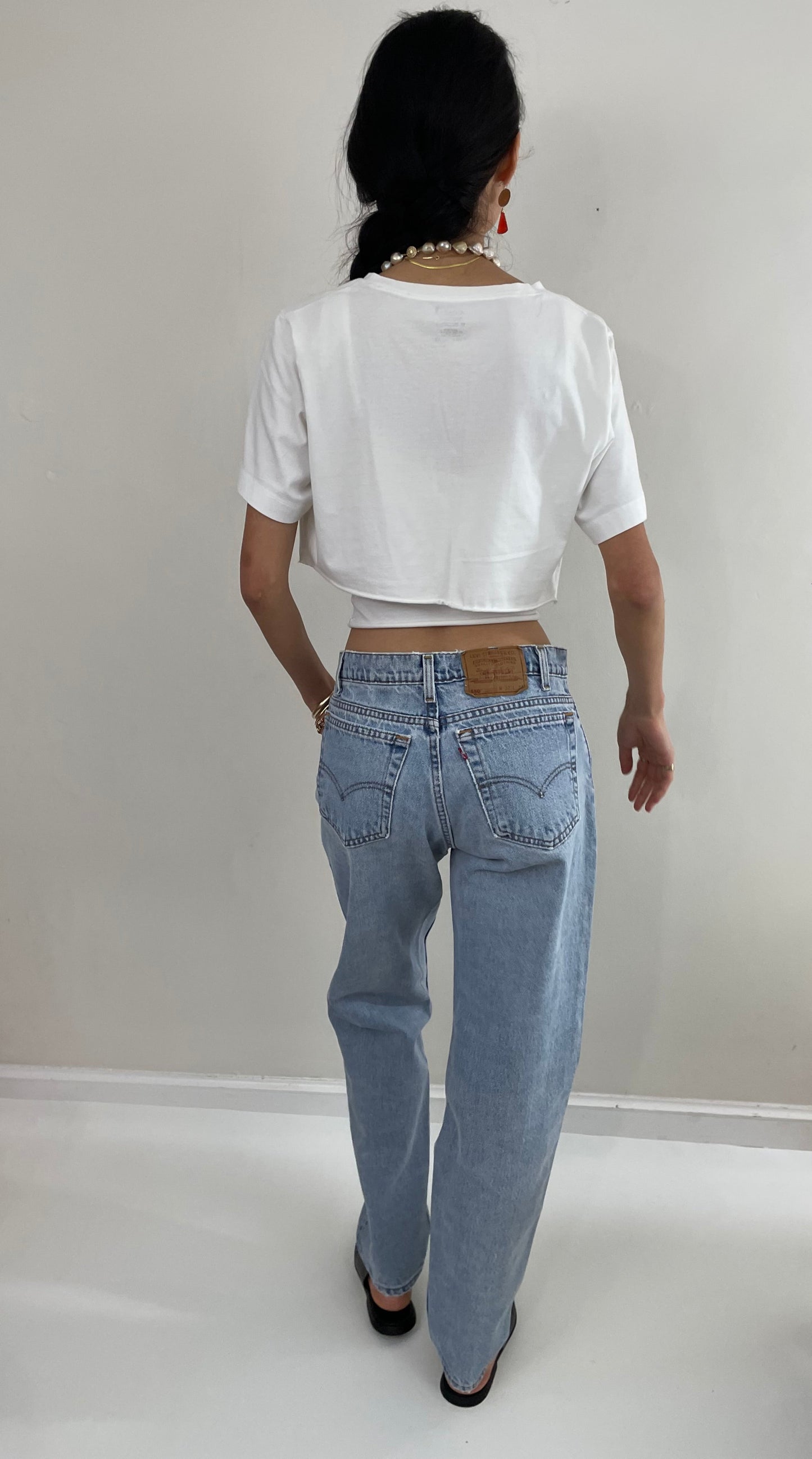 Vintage Levi's faded soft boyfriend relaxed fit high waisted zipper fly red tab light wash Levis 550 Dad jeans made in USA size Waist 31 x 33