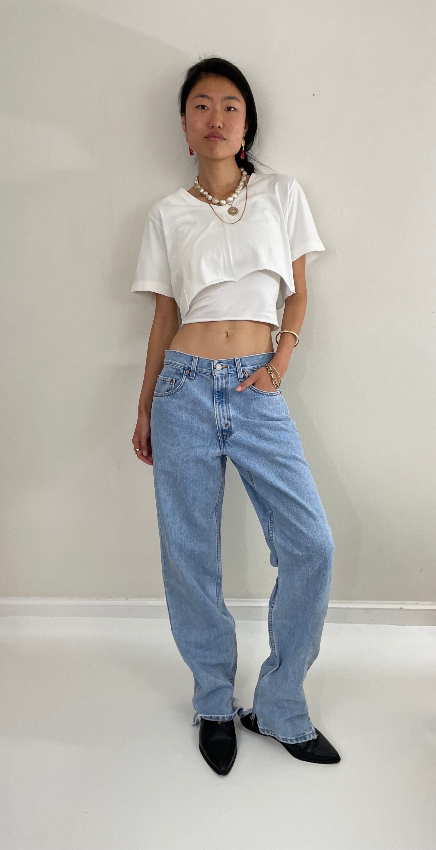 Vintage Levi's faded soft tall boyfriend relaxed fit zipper fly red tab light wash Levis 550 jeans size 31 x 34