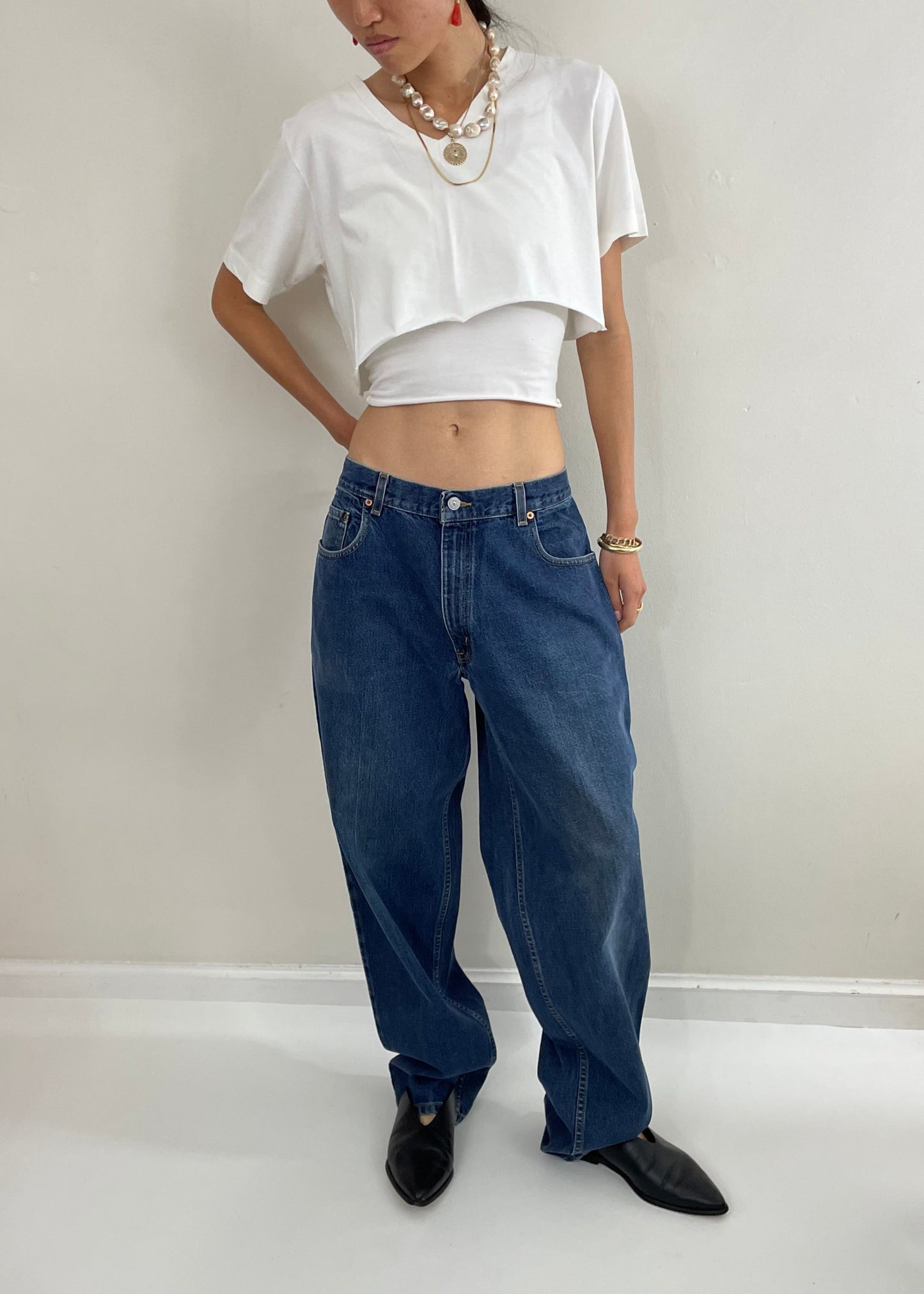 vintage Levi's 570 tall baggy fit zipper fly medium wash 90s barrel leg hip hop jeans size 32 x 35
