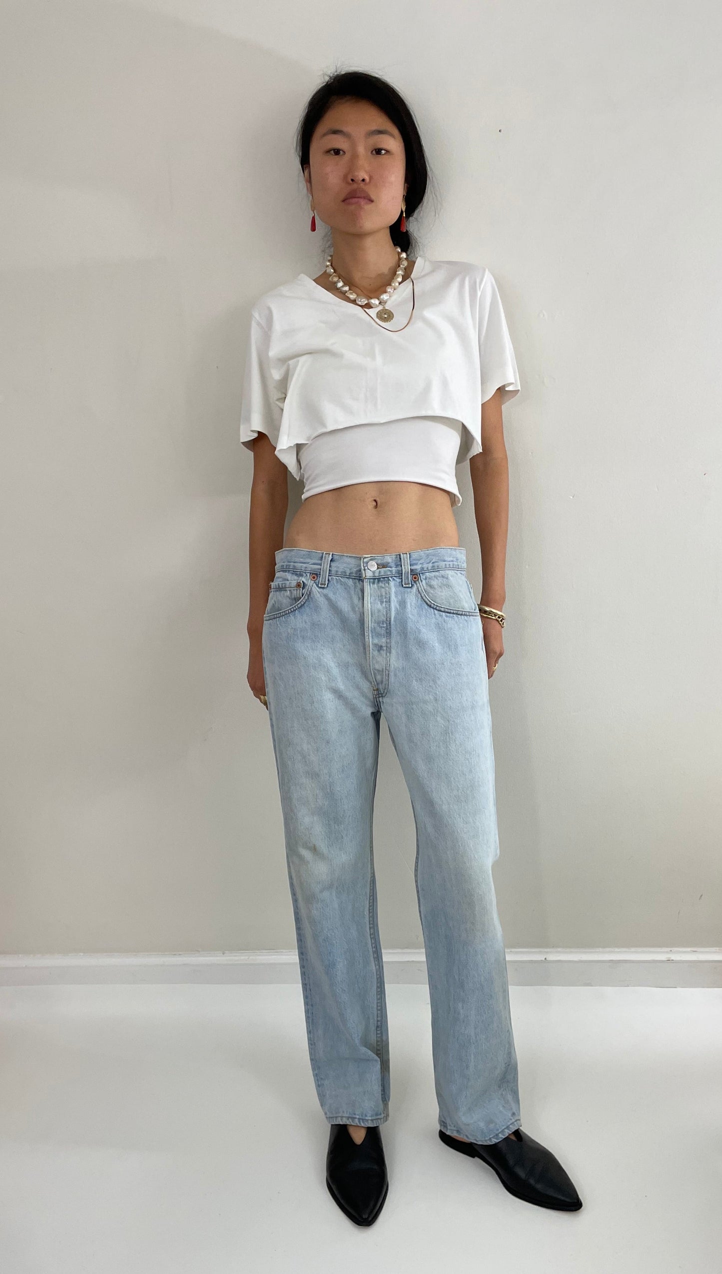 Vintage 80s Levi's 501 faded button fly light stone wash red tab Levis iconic jeans USA size 32 x 29