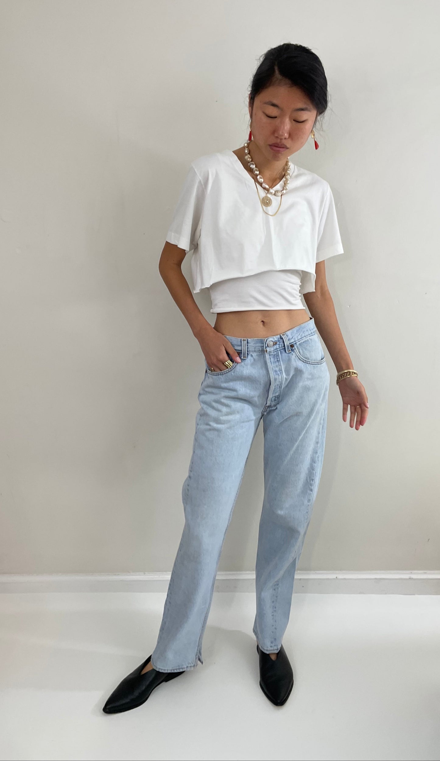 Vintage 80s Levi's 501 faded light wash button fly boyfriend Levis red tab jeans made in USA size 29 x 31