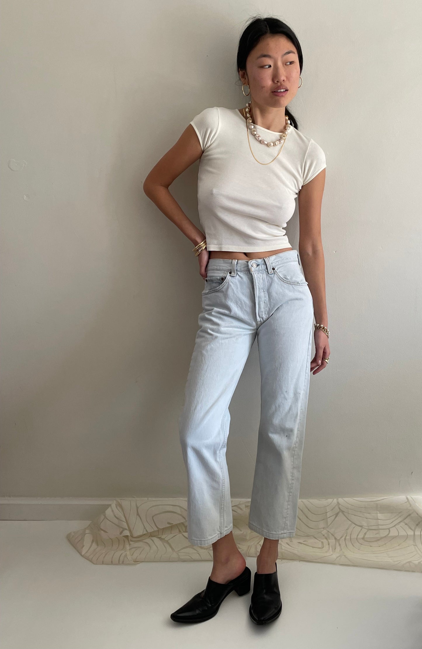 Vintage Levis 501 button fly faded boyfriend light stonewash jeans made in USA size 28