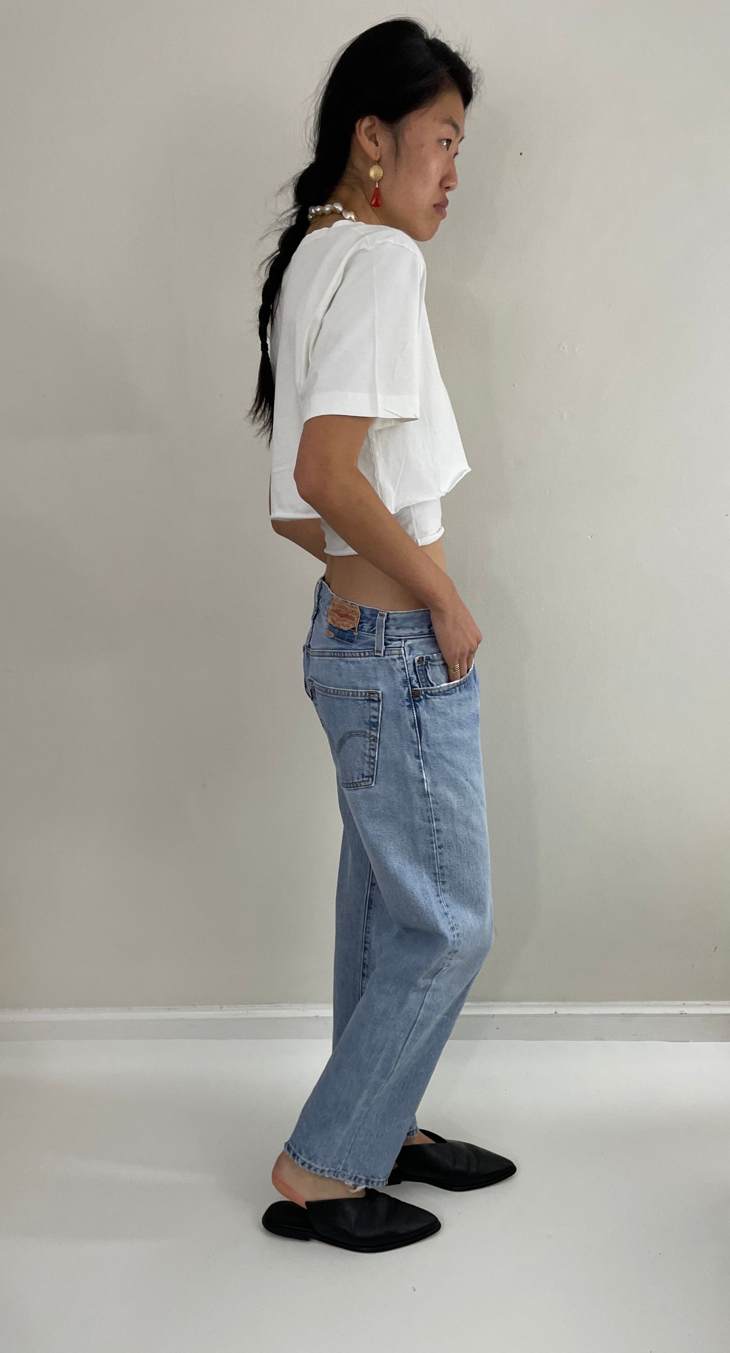 Vintage 80s Levi's 501 faded button fly medium light wash red tab Levis iconic jeans size 31 x 29