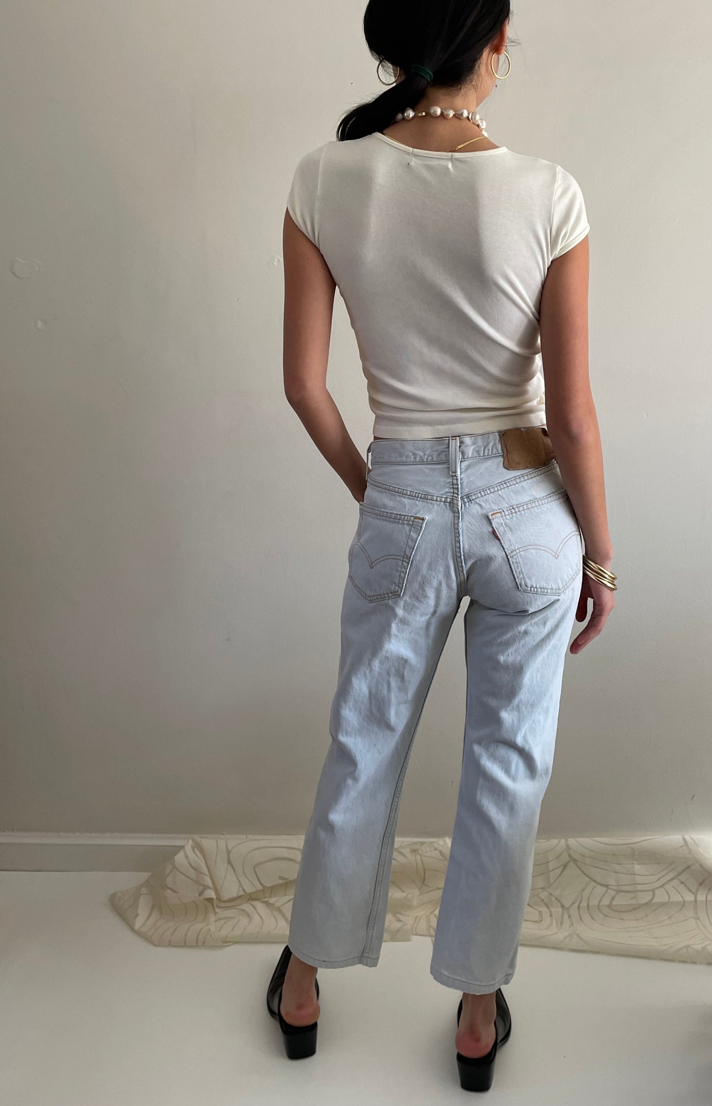 Vintage Levis 501 button fly faded boyfriend light stonewash jeans made in USA size 28