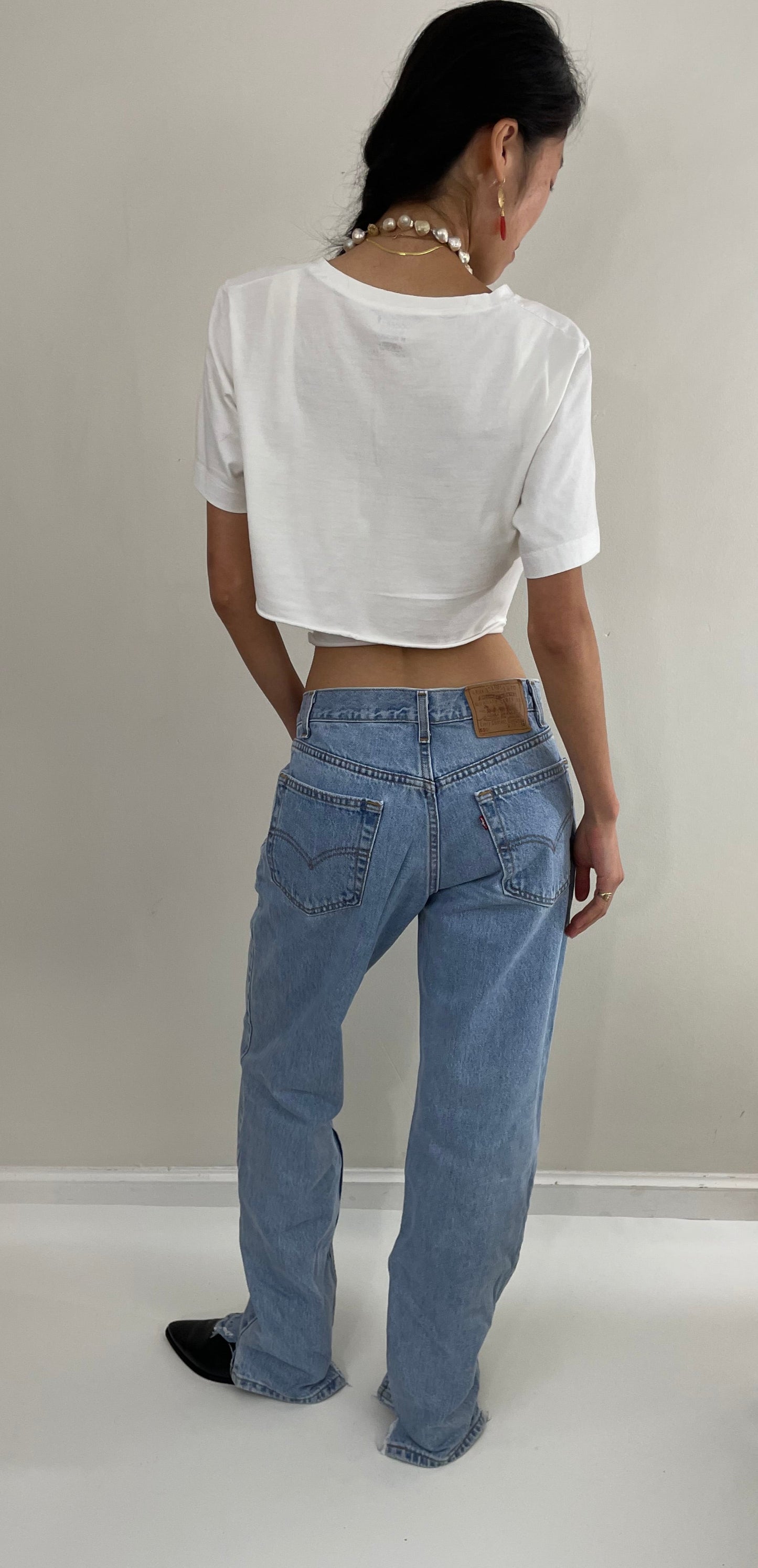 Vintage Levi's faded soft tall boyfriend relaxed fit zipper fly red tab light wash Levis 550 jeans size 31 x 34