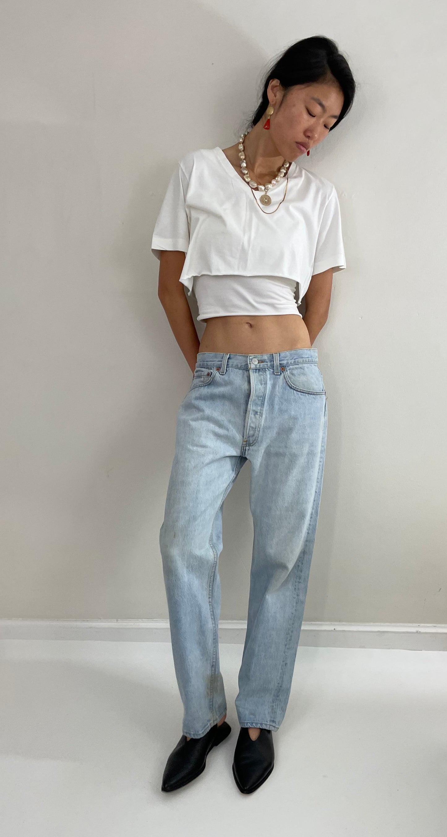 Vintage 80s Levi's 501 faded button fly light stone wash red tab Levis iconic jeans USA size 32 x 29