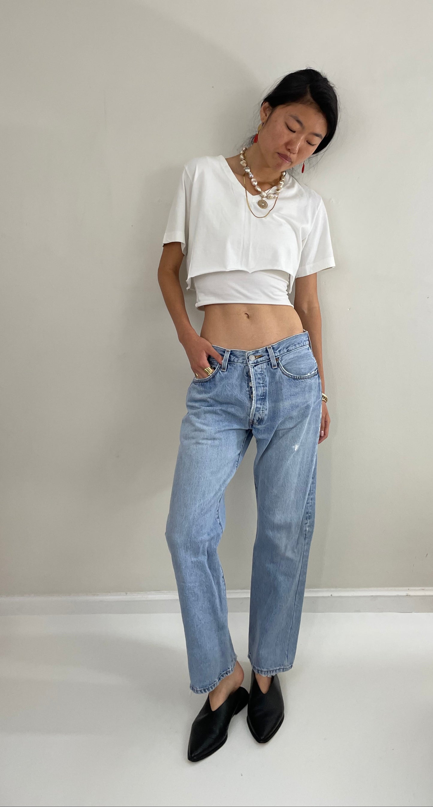 Vintage 80s Levi's 501 faded button fly medium light wash red tab Levis iconic jeans size 31 x 29
