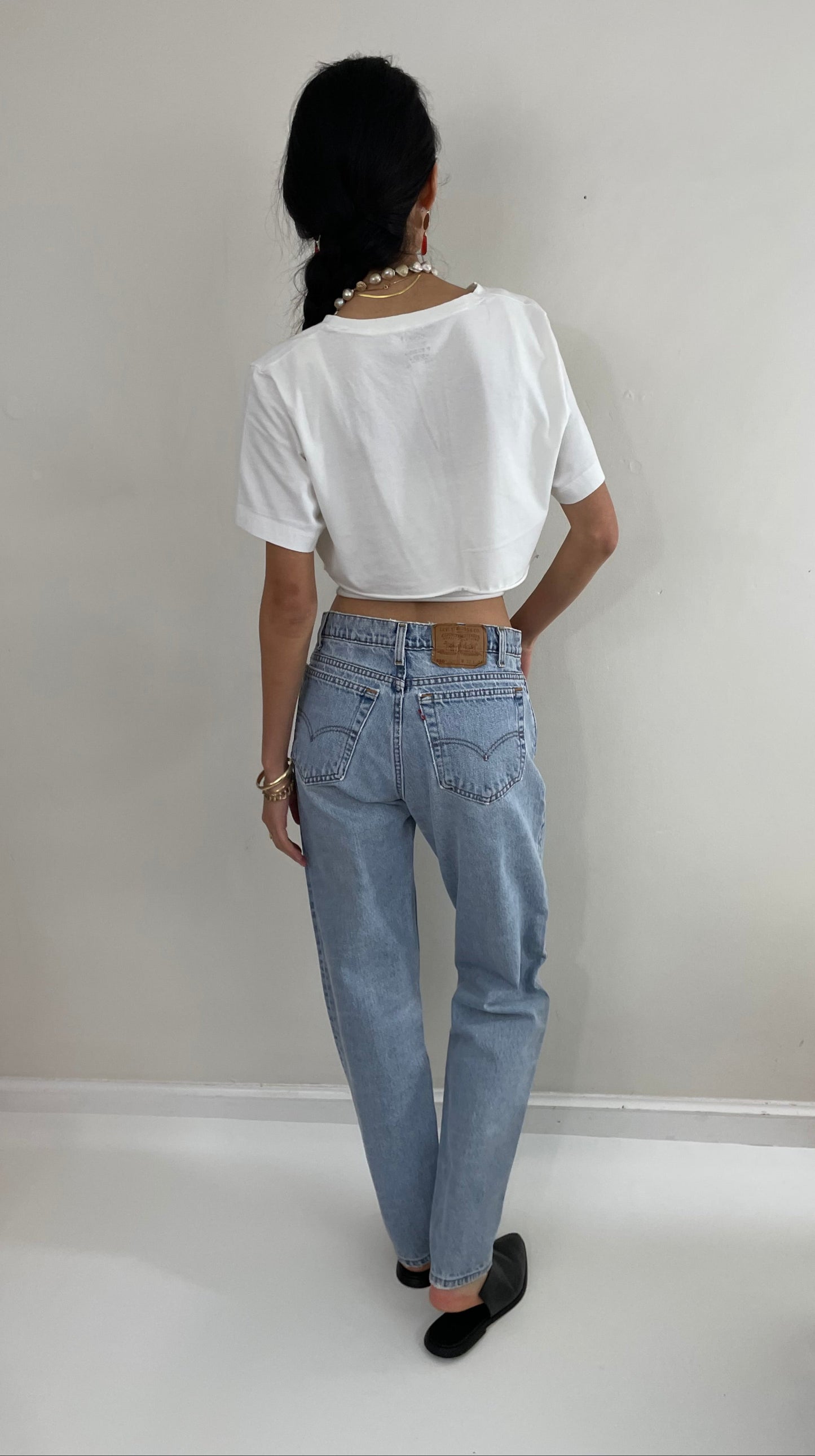 Vintage Levi's faded soft boyfriend relaxed fit high waisted zipper fly red tab light wash Levis 550 Dad jeans made in USA size Waist 31 x 33