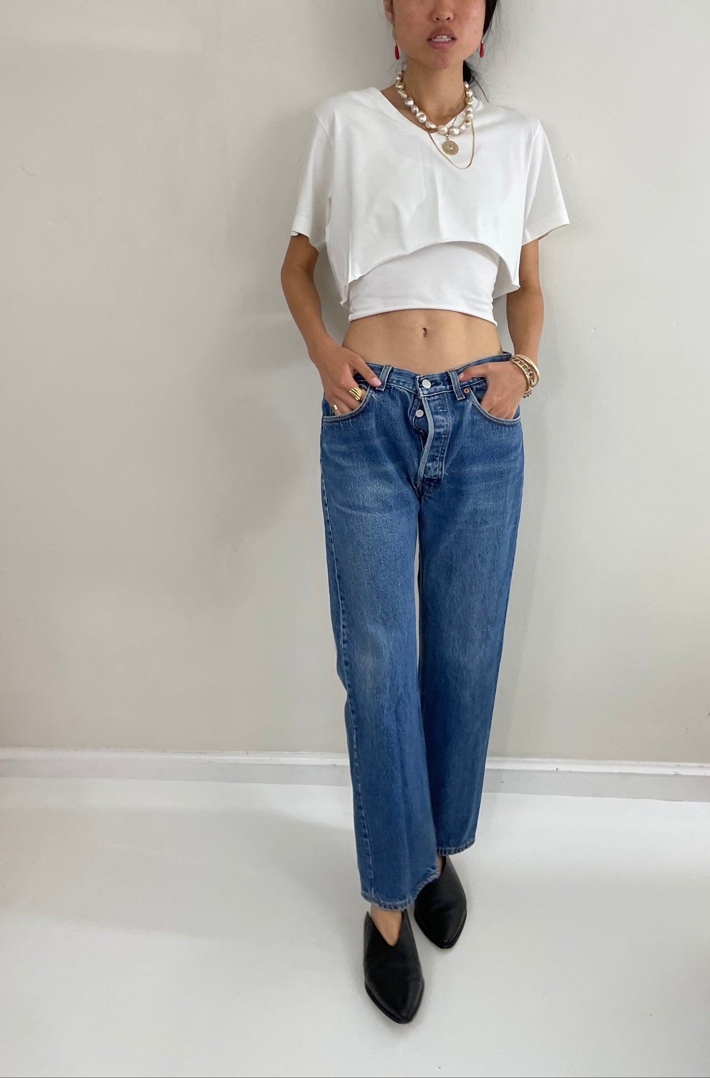 31 Vintage 80s Levi's 501 faded medium wash iconic red tab button fly LEVIS jeans made in USA size 31 x 29