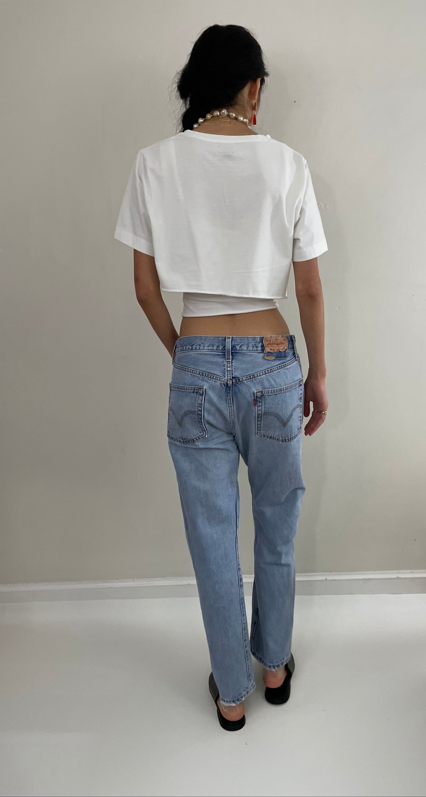 Vintage 80s Levi's 501 faded button fly medium light wash red tab Levis iconic jeans size 31 x 29