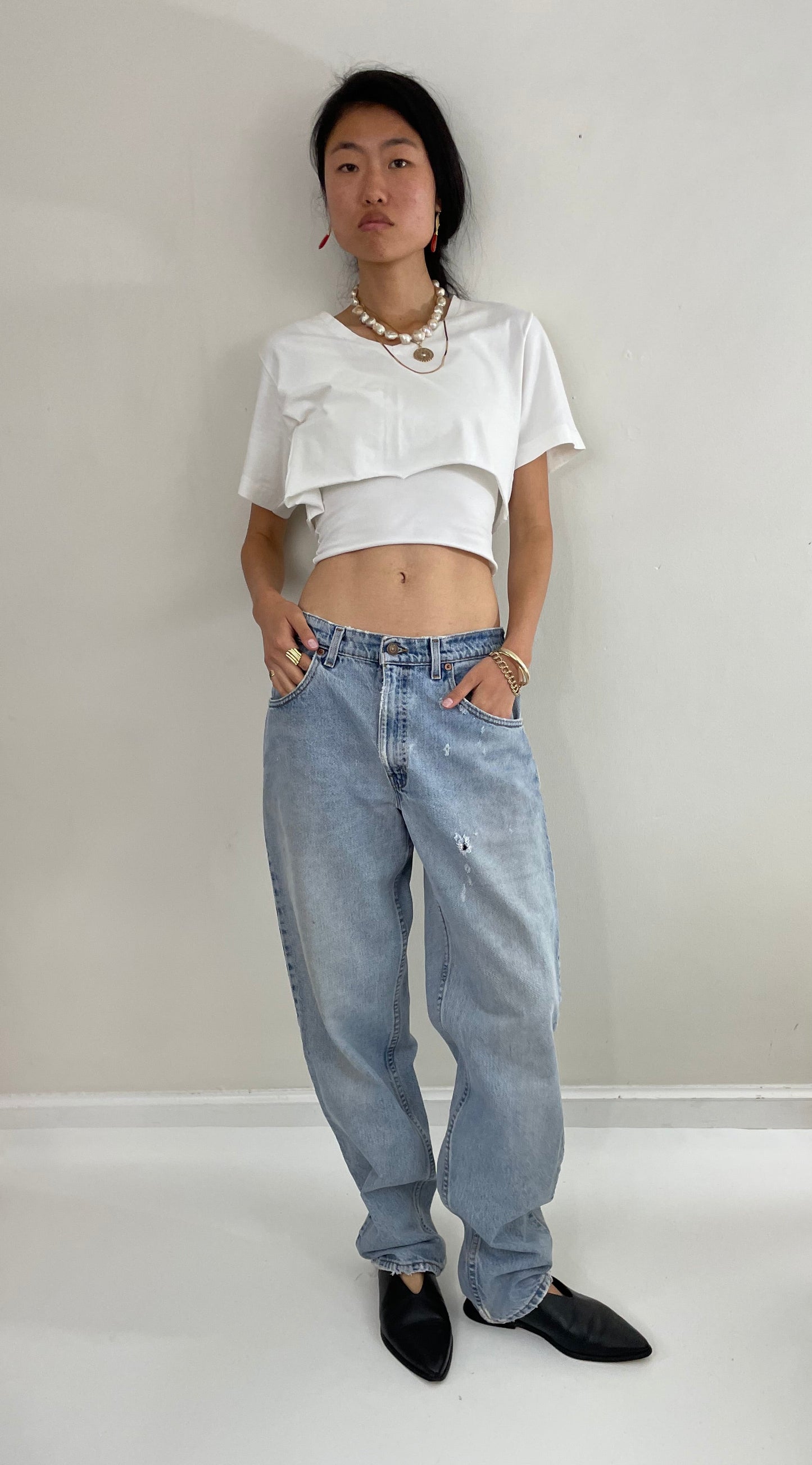 vintage 80s Levi's 560 faded loose fit relaxed Tall Levis jeans made in USA size 31 x 34