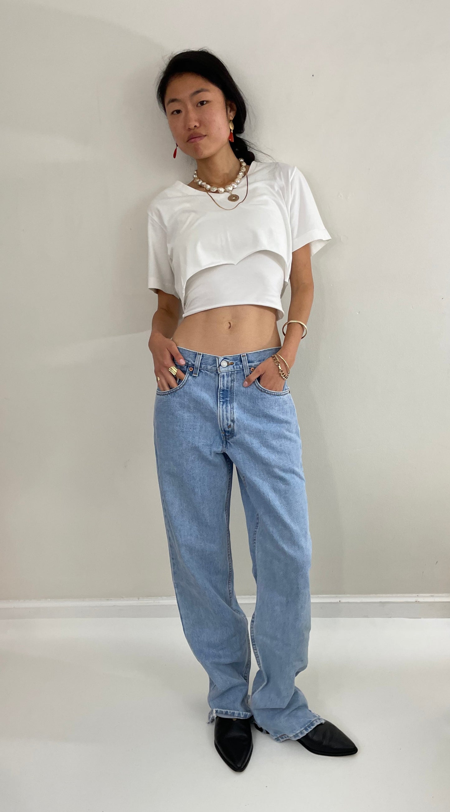 Vintage Levi's faded soft tall boyfriend relaxed fit zipper fly red tab light wash Levis 550 jeans size 31 x 34