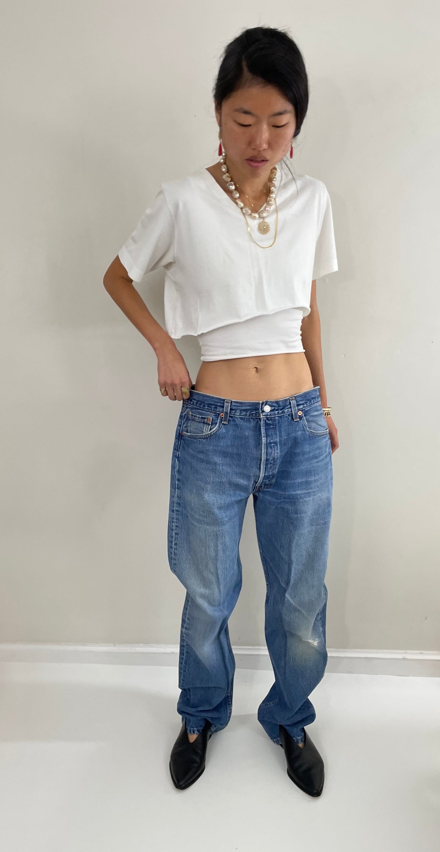 Vintage 80s Levis 501 button fly soft faded tall boyfriend baggy medium wash Levis jeans made in USA size 33 x 34