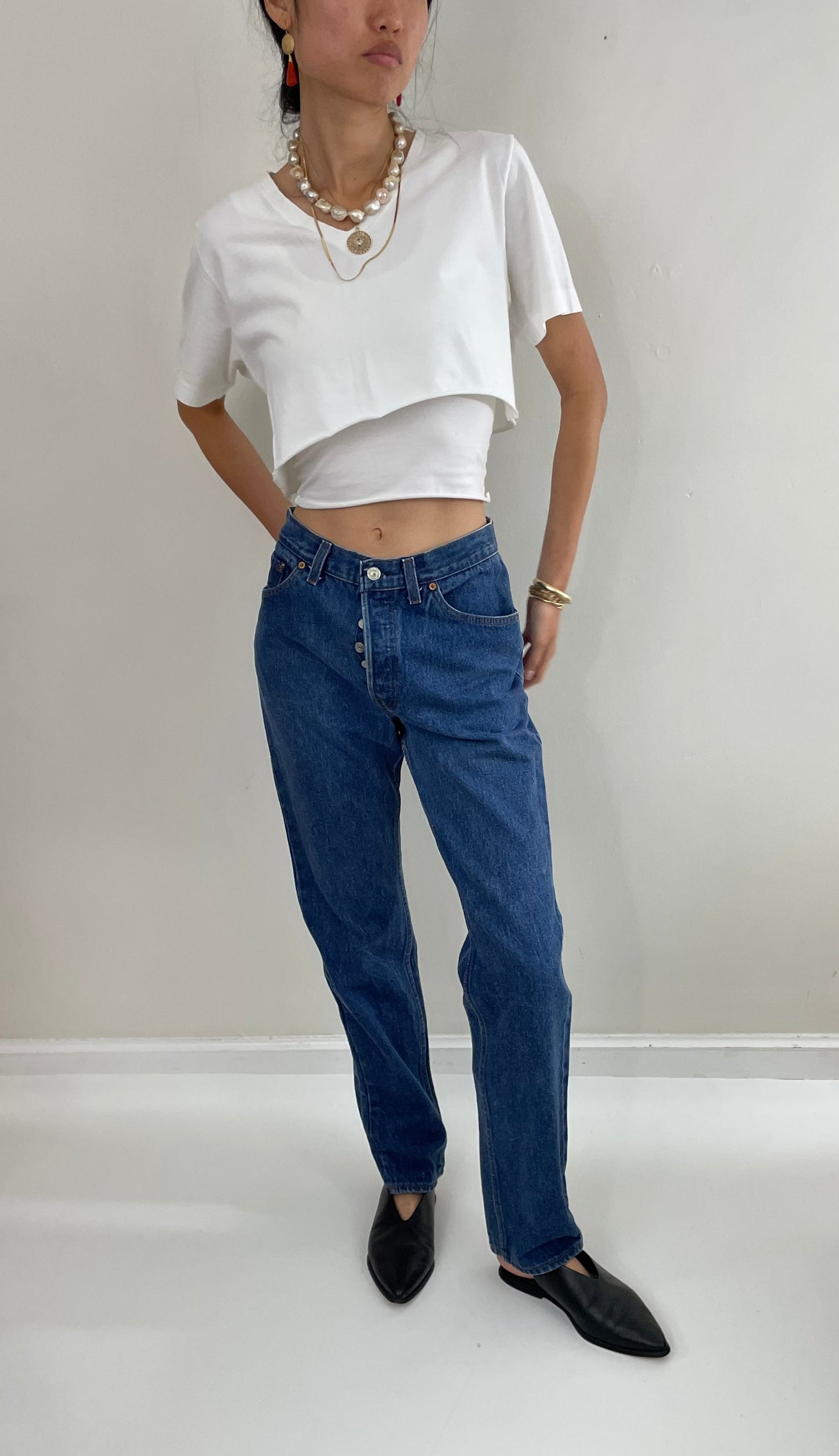 Vintage 80s Levi's 501 dark wash shrink to fit high waisted made for Women button fly tall Levis jeans size 27 x 32