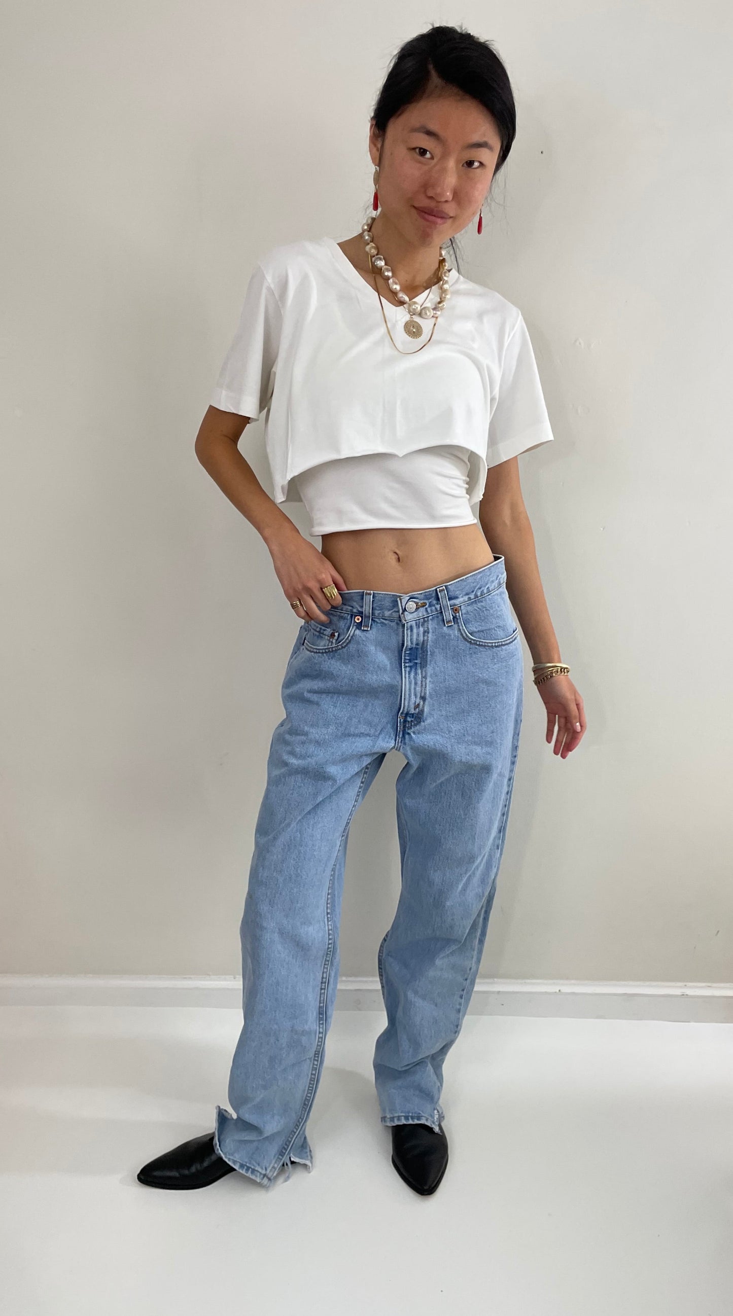 Vintage Levi's faded soft tall boyfriend relaxed fit zipper fly red tab light wash Levis 550 jeans size 31 x 34