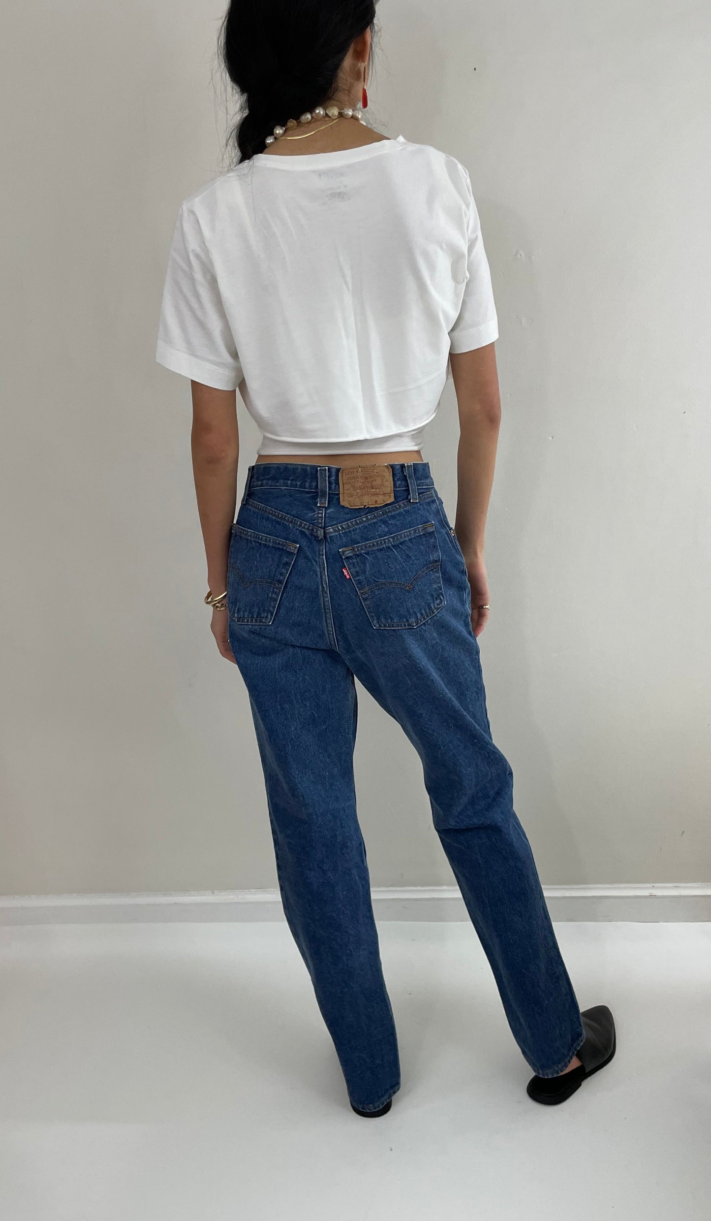 Vintage 80s Levi's 501 dark wash shrink to fit high waisted made for Women button fly tall Levis jeans size 27 x 32