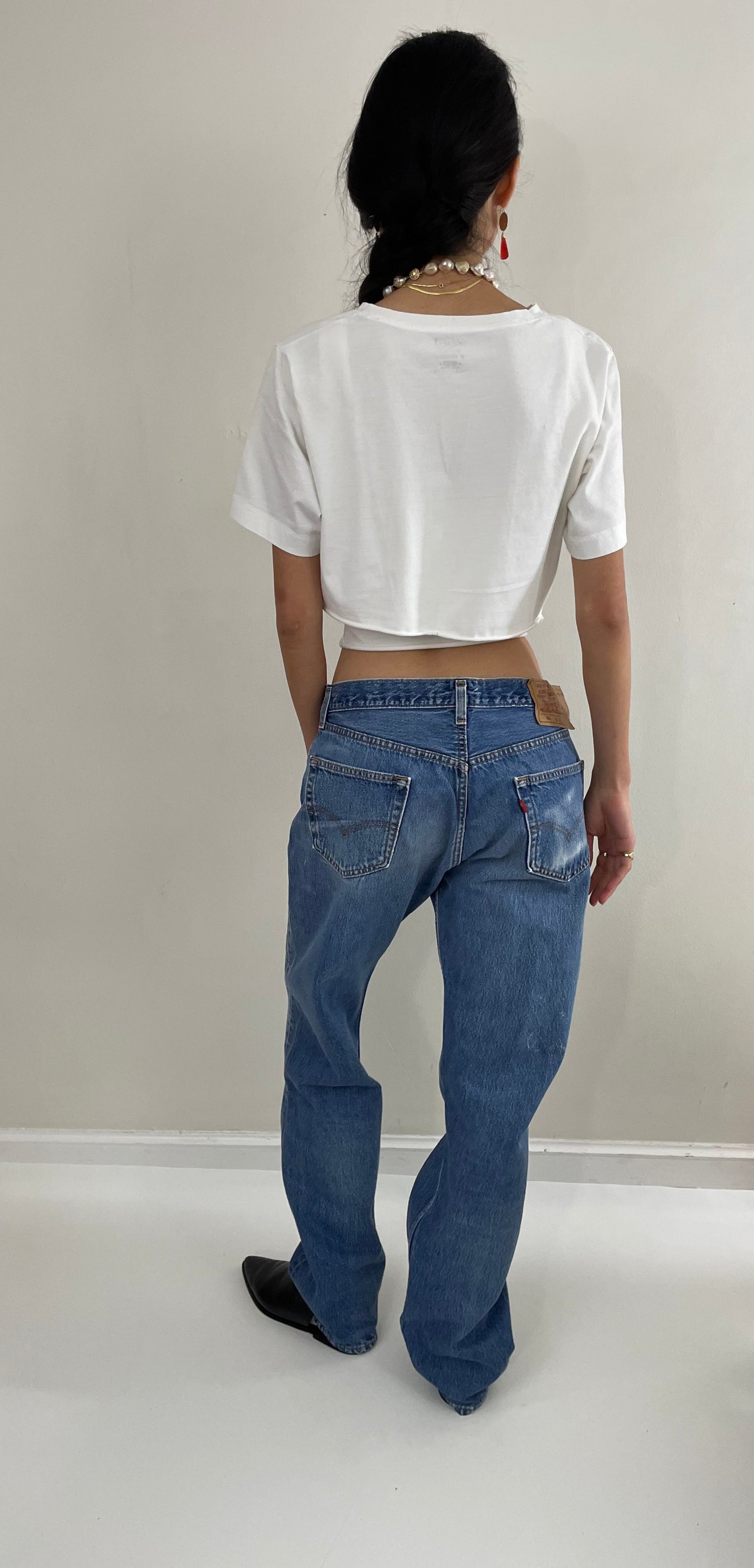 Vintage 80s Levis 501 button fly soft faded tall boyfriend baggy medium wash Levis jeans made in USA size 33 x 34