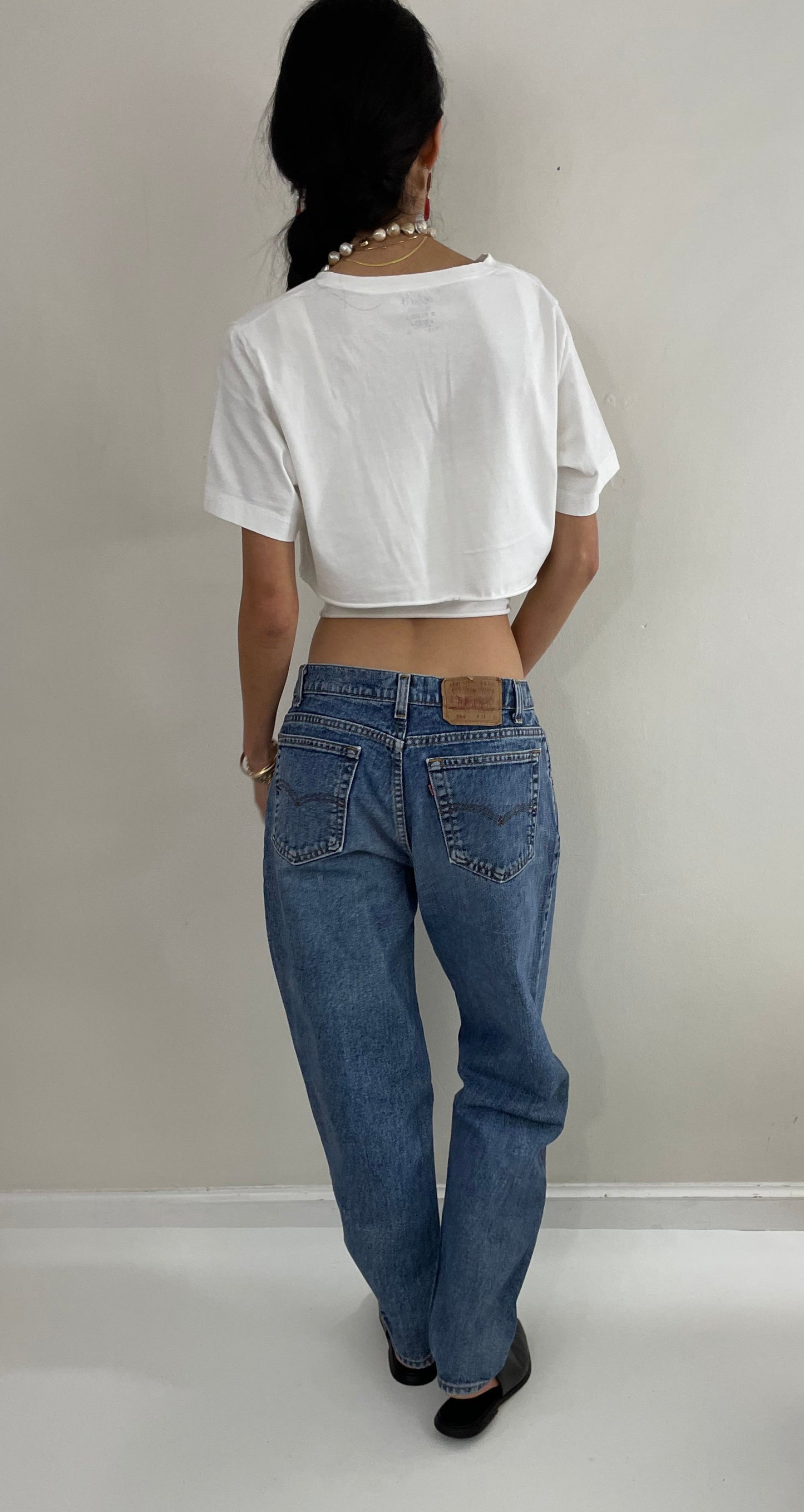 Vintage 80s Levi's 560 medium wash high waisted zipper relaxed faded red tab Levis jeans USA size 31 x 30