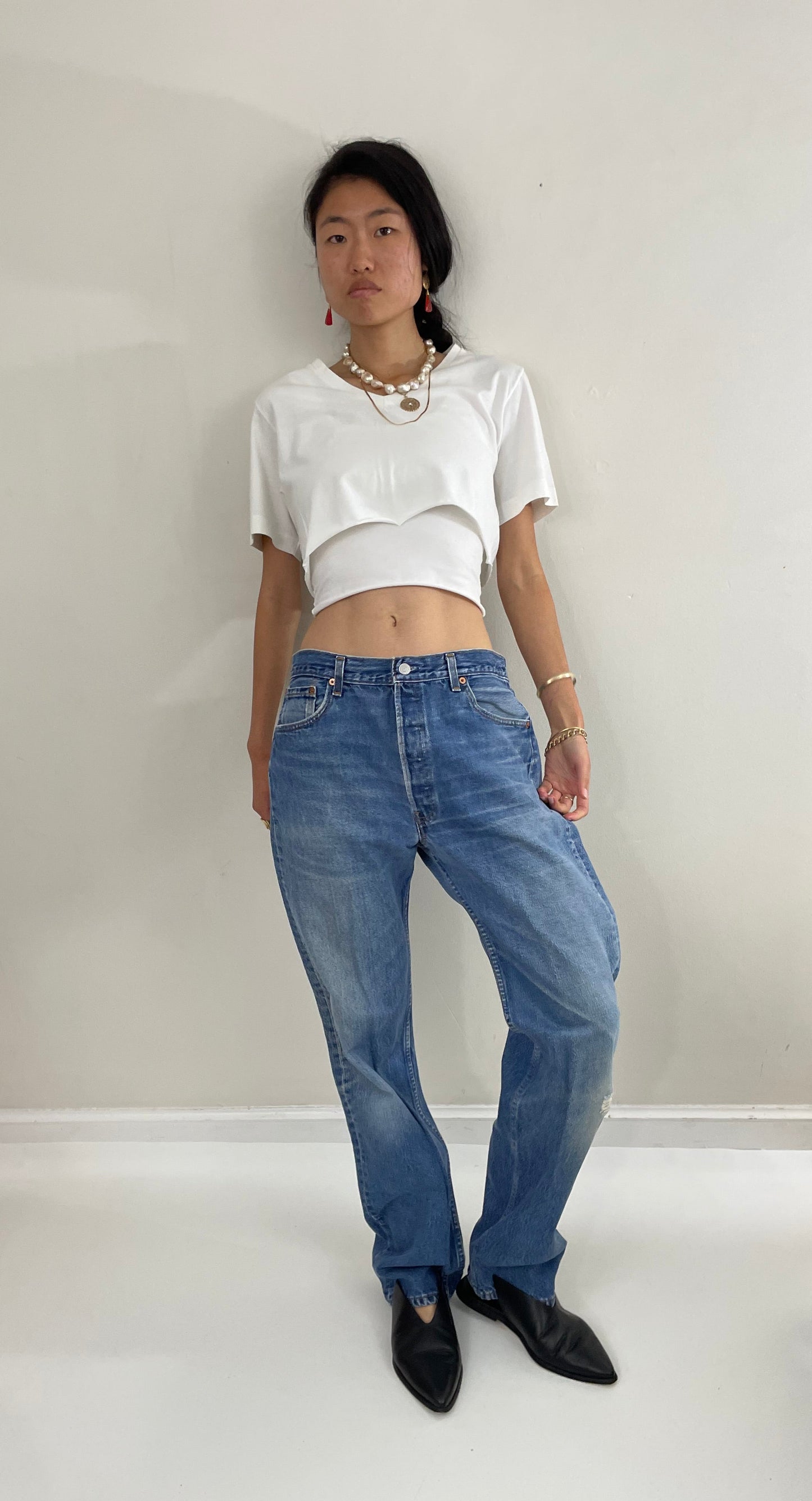 Vintage 80s Levis 501 button fly soft faded tall boyfriend baggy medium wash Levis jeans made in USA size 33 x 34