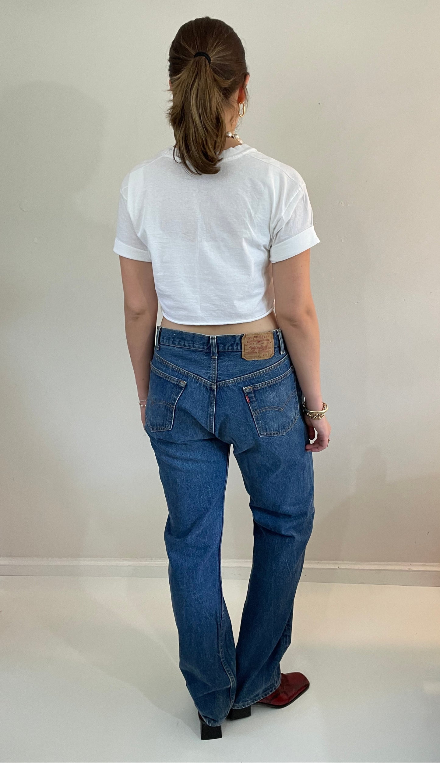 vintage Levi's 501 medium dark wash button fly tall boyfriend jeans made in USA size 33