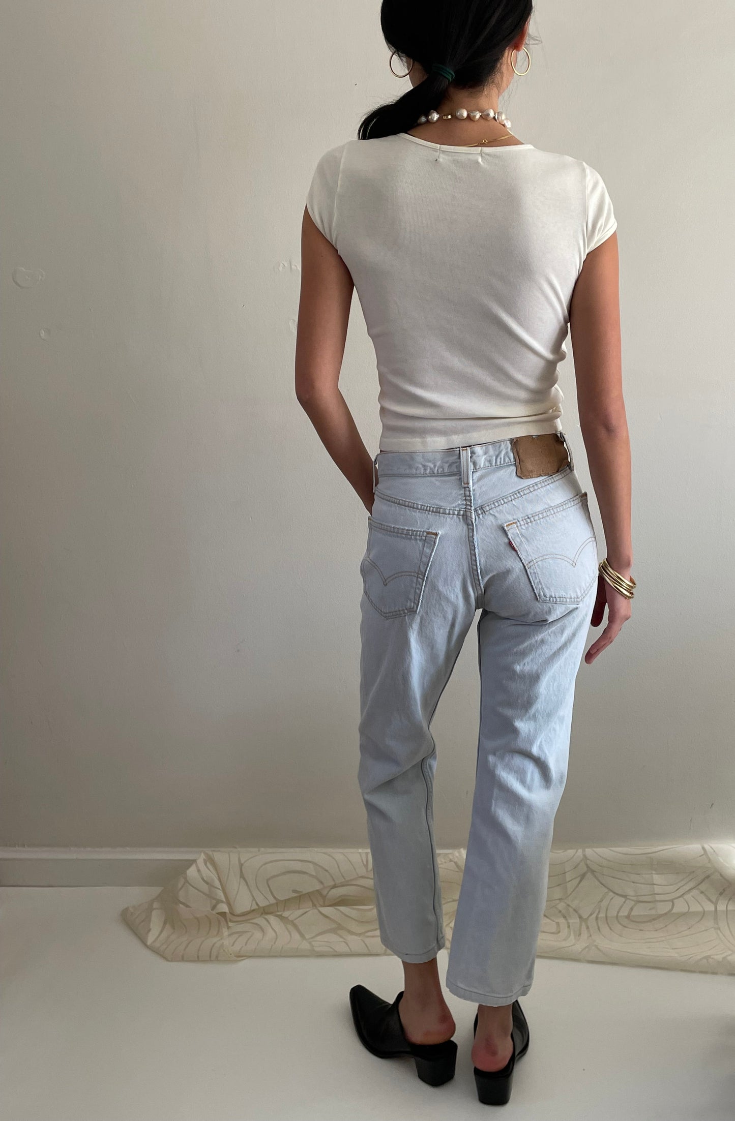 Vintage Levis 501 button fly faded boyfriend light stonewash jeans made in USA size 28
