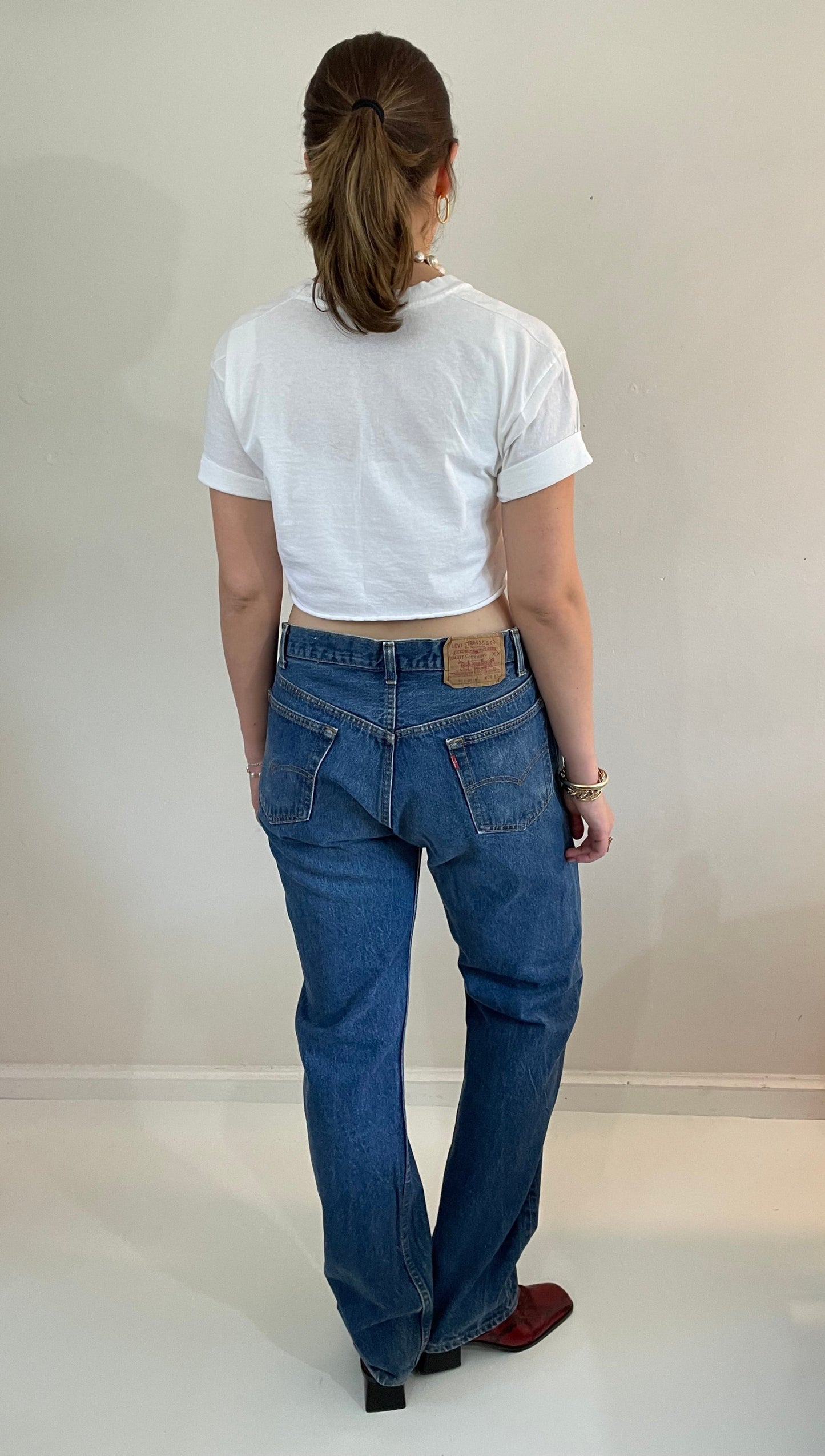 vintage Levi's 501 medium dark wash button fly tall boyfriend jeans made in USA size 33