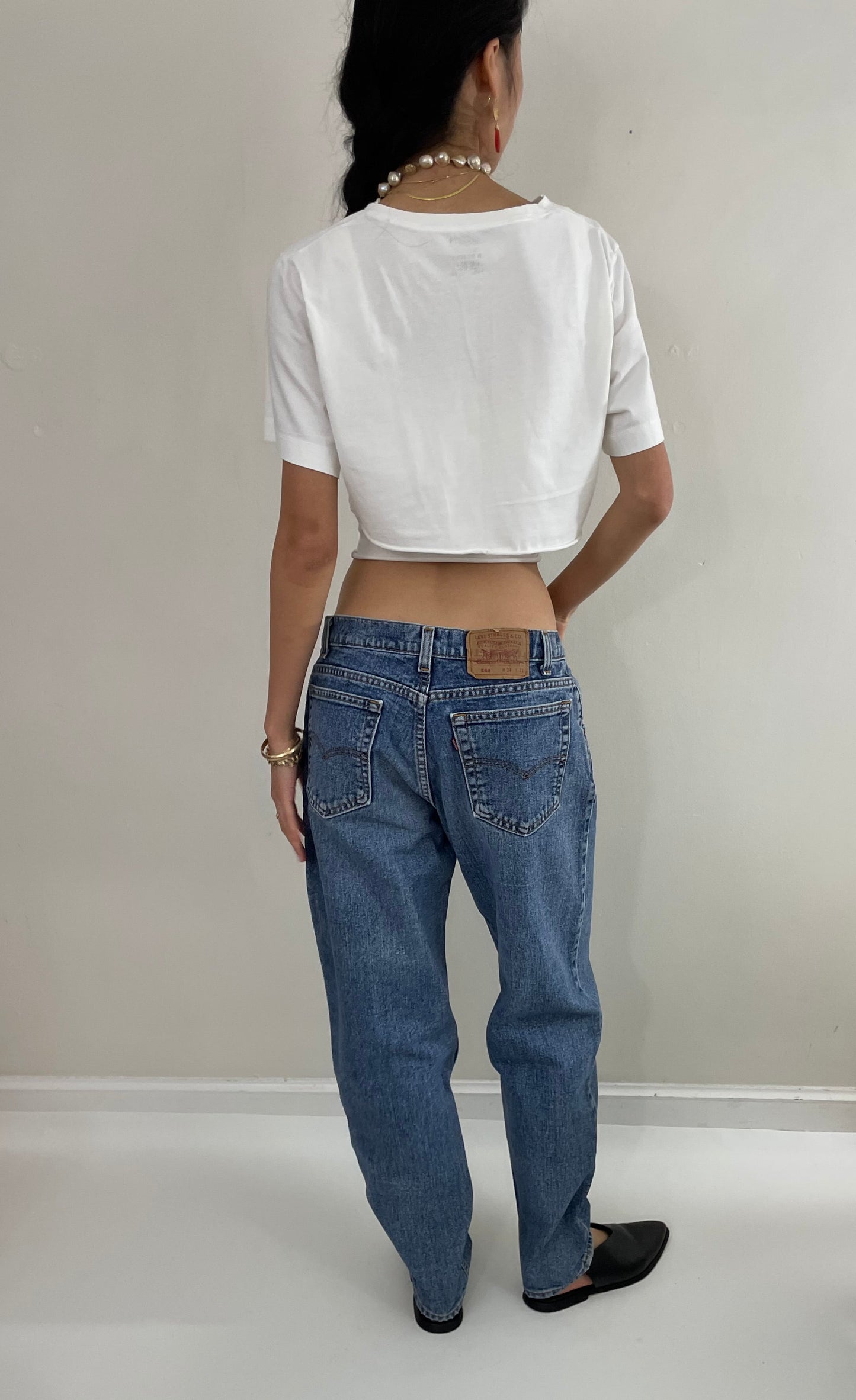 Vintage 80s Levi's 560 medium wash high waisted zipper relaxed faded red tab Levis jeans USA size 31 x 30