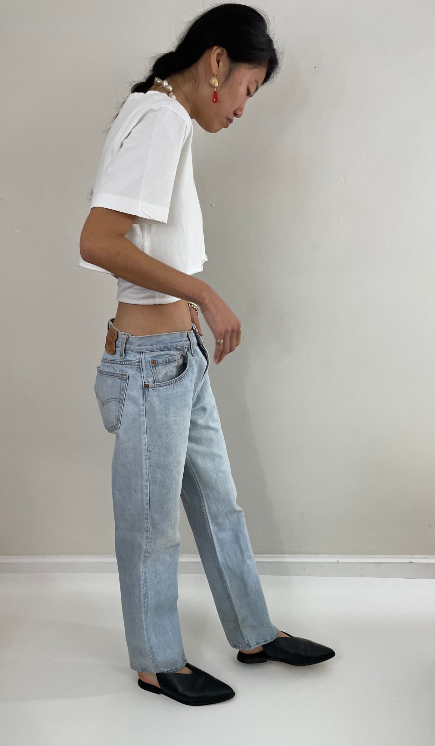 Vintage 80s Levi's 501 faded button fly light stone wash red tab Levis iconic jeans USA size 32 x 29