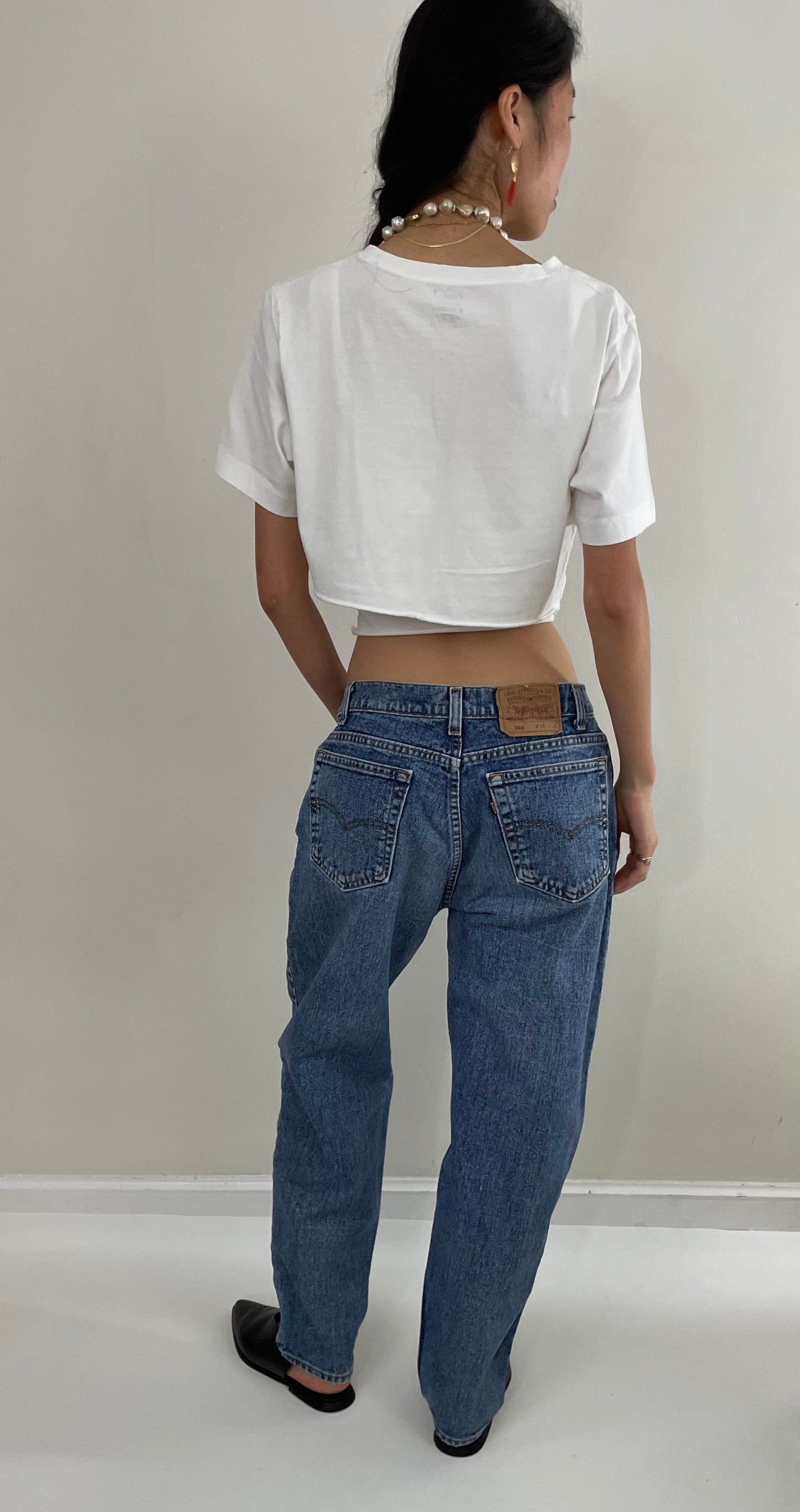 Vintage 80s Levi's 560 medium wash high waisted zipper relaxed faded red tab Levis jeans USA size 31 x 30