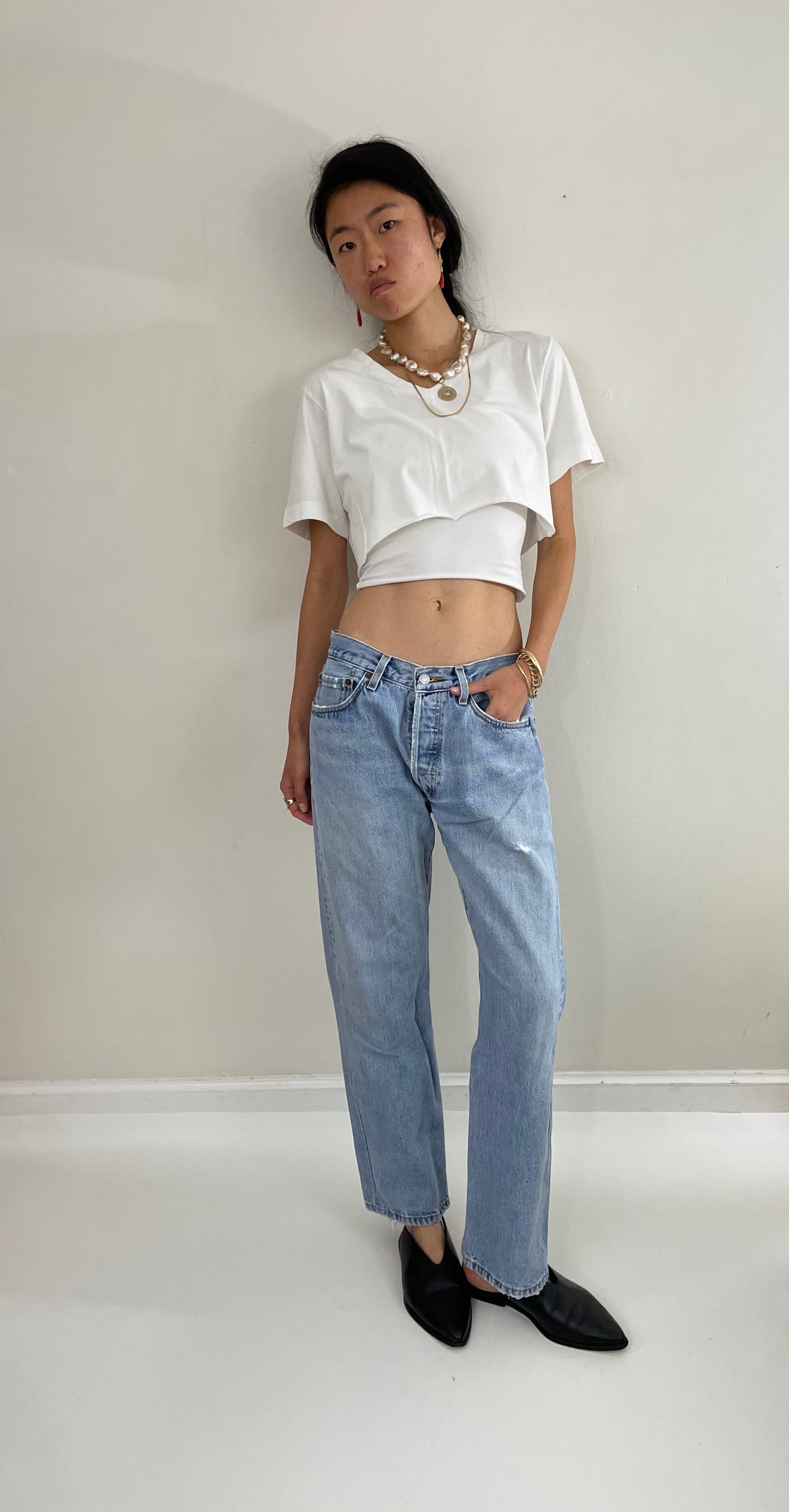 Vintage 80s Levi's 501 faded button fly medium light wash red tab Levis iconic jeans size 31 x 29