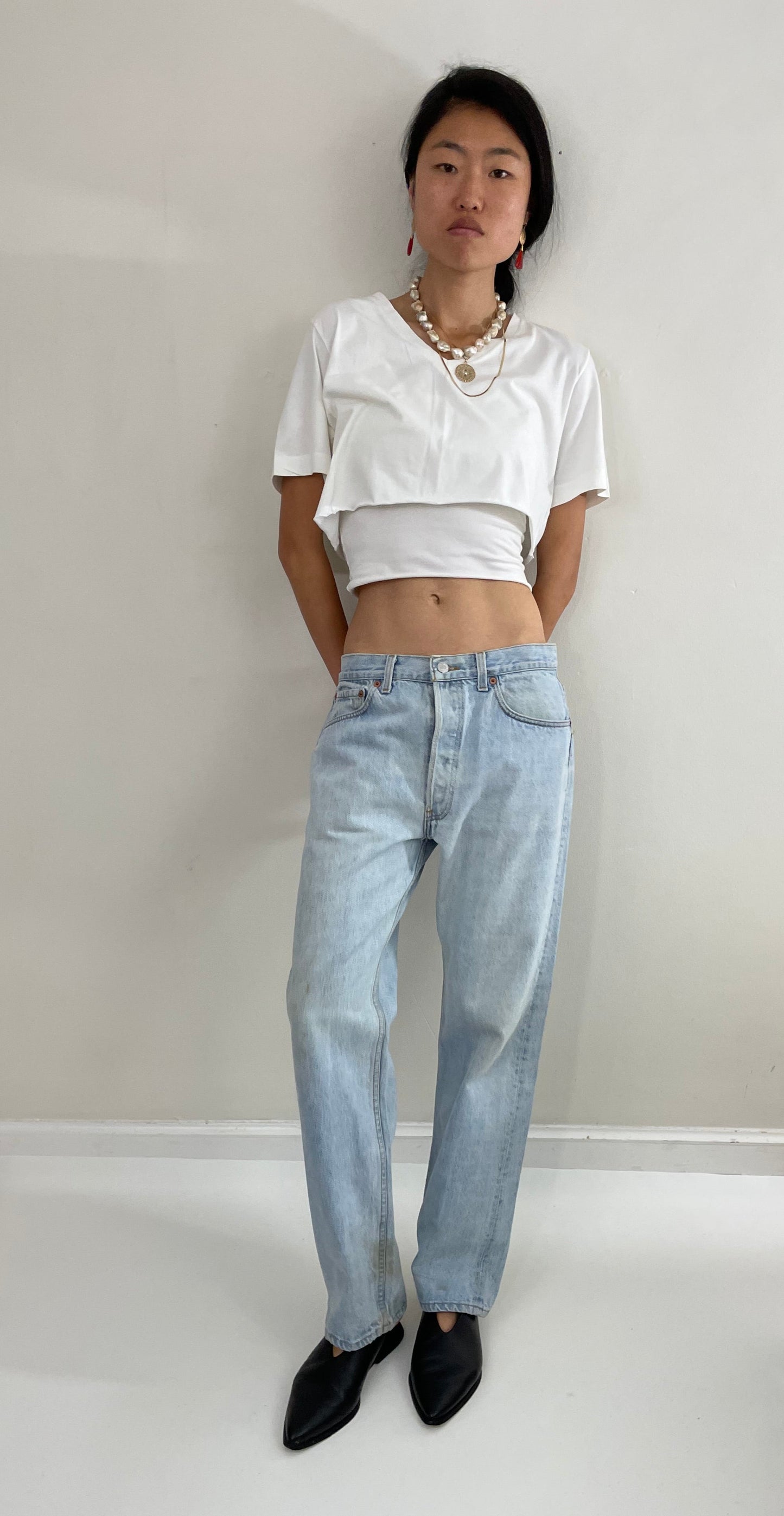 Vintage 80s Levi's 501 faded button fly light stone wash red tab Levis iconic jeans USA size 32 x 29